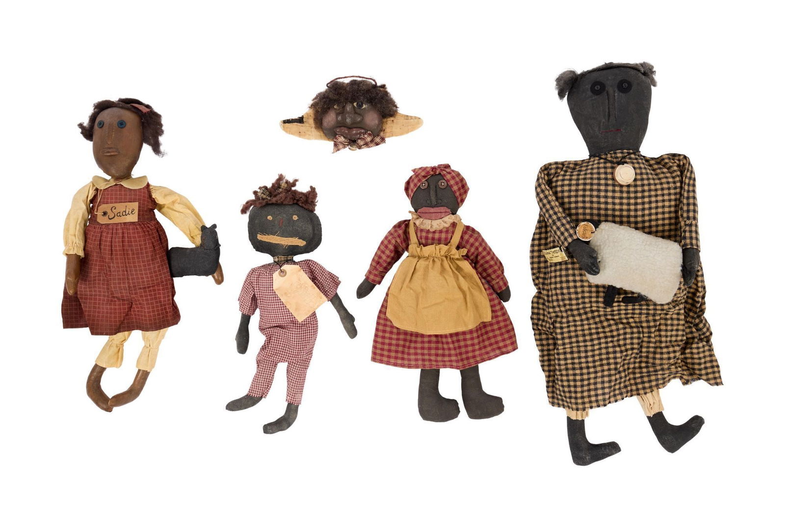 Whoopi Goldberg | Five Black Folk Art Dolls Primitive.: A group of five cloth Black folk art dolls from Whoopi Goldberg's large collection, with handwritten notecards by Goldberg, numbering, naming, and categorizing them. Goldberg has categorized this grou
