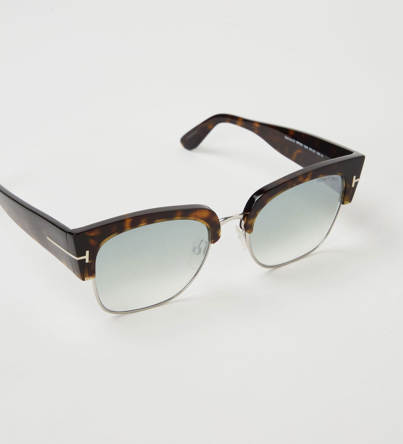 Gwyneth Paltrow | Tom Ford Clubmaster Sunglasses: Tom Ford clubmaster sunglasses from the collection of Gwyneth Paltrow. Featuring a brown Havana frame with green gradient lenses and silver tone metal. Finished with the brand signature on t