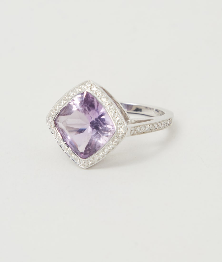 Gwyneth Paltrow | Asprey 18K White Gold Amethyst and Diamond Ring: 18K White Gold Amethyst and Diamond Ring designed by Asprey from the collection of Gwyneth Paltrow.The ring features a diagonally set cushion-cut amethyst framed by circular-cut diamonds on the b