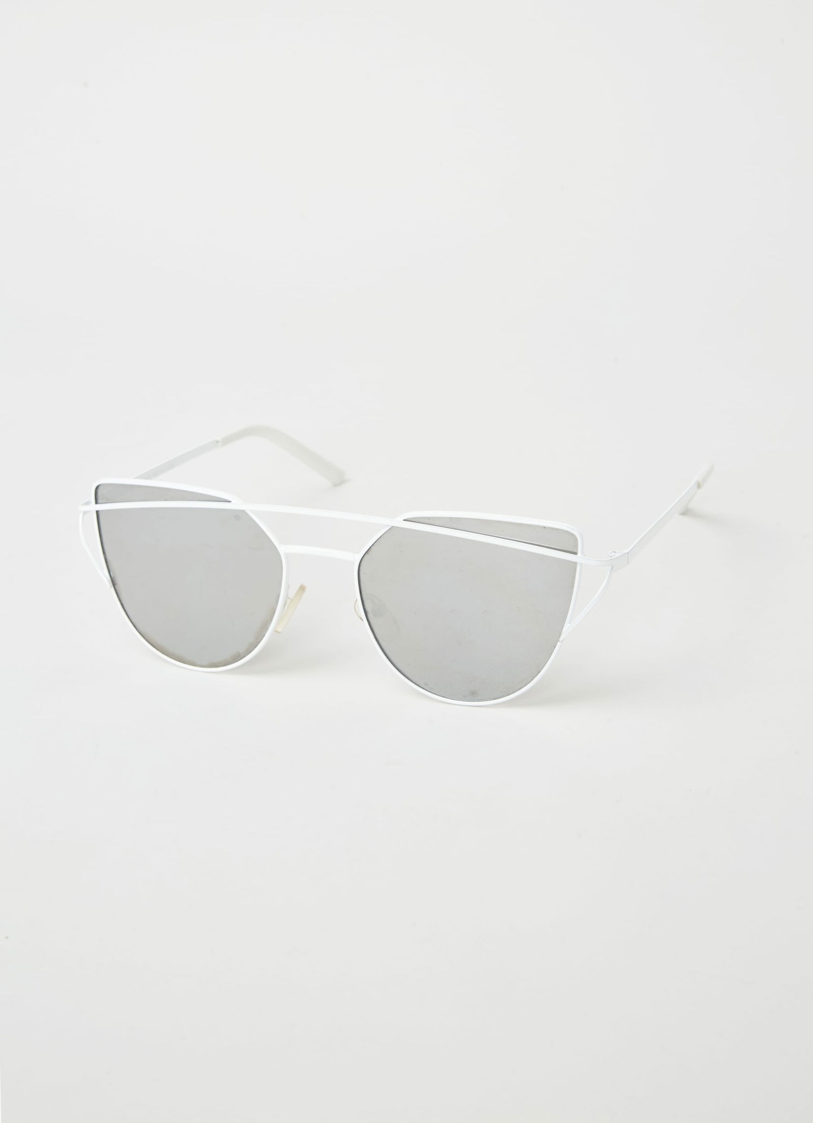 Gwyneth Paltrow | Gentle Monster Love Punch Cat Eye Sunglasses: Gentle Monster Love Punch cat eye sunglasses from the collection of Gwyneth Paltrow. White silver titanium frame mirrored lenses. UV 400 protection. From the Collection of Gwyneth Paltrow