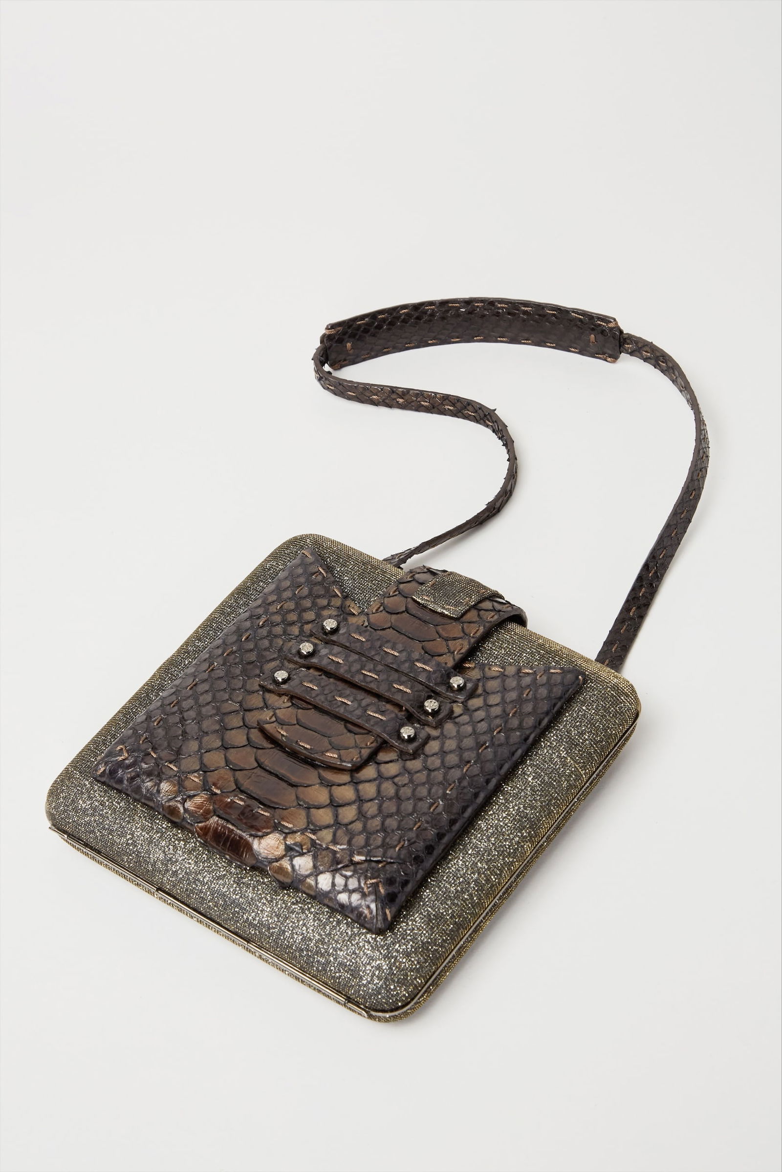 Gwyneth Paltrow | 2009 Vernon Bruce Hoeksema Limited Edition Clutch (With Signed Image):  A Vernon Bruce Hoeksema clutch from the collection of Gwyneth Paltrow.A square compact structured clutch with shoulder strap. The compact is composed of gold and silver metallic fabric with snak
