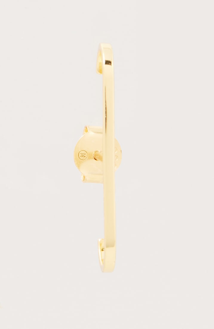 Gwyneth Paltrow | Gold-Plated Sterling Silver Ear Stud:  A single gold-plated sterling silver ear stud, from the collection of Gwyneth Paltrow. The silver ear stud is designed as a curving line, weighing 0.3 grams. Earring stamped 925. 