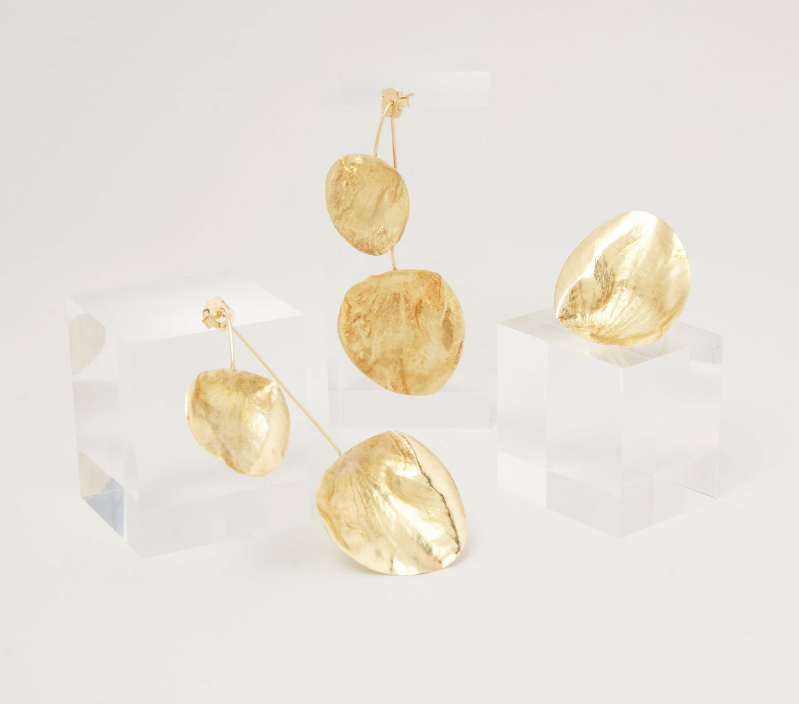 Gwyneth Paltrow | TOUS Ear Pendant and Ring: A set comprising a pair of ear pendants and a ring designed by TOUS from the collection of Gwyneth Paltrow.The earrings are designed as two organically formed 18k yellow gold leaves connected by a wir