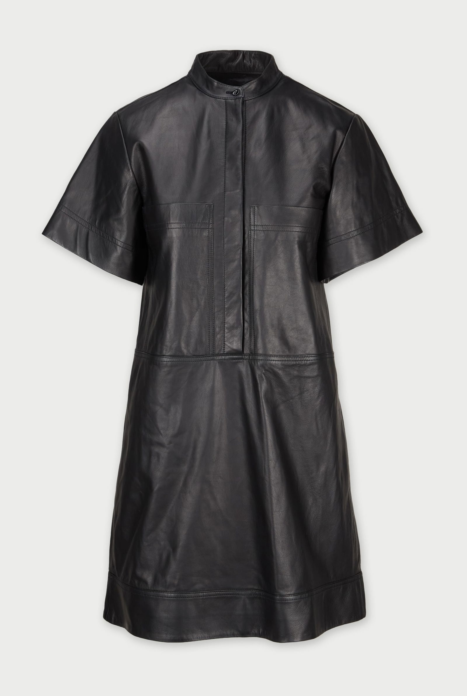 Gwyneth Paltrow | goop G. Label Black Leather Dress : A black sheep leather dress designed by goop G. Label, from the collection of Gwyneth Paltrow.Crafted in black sheep leather, the piece features a clean mandarin-style collar and a concealed partial b
