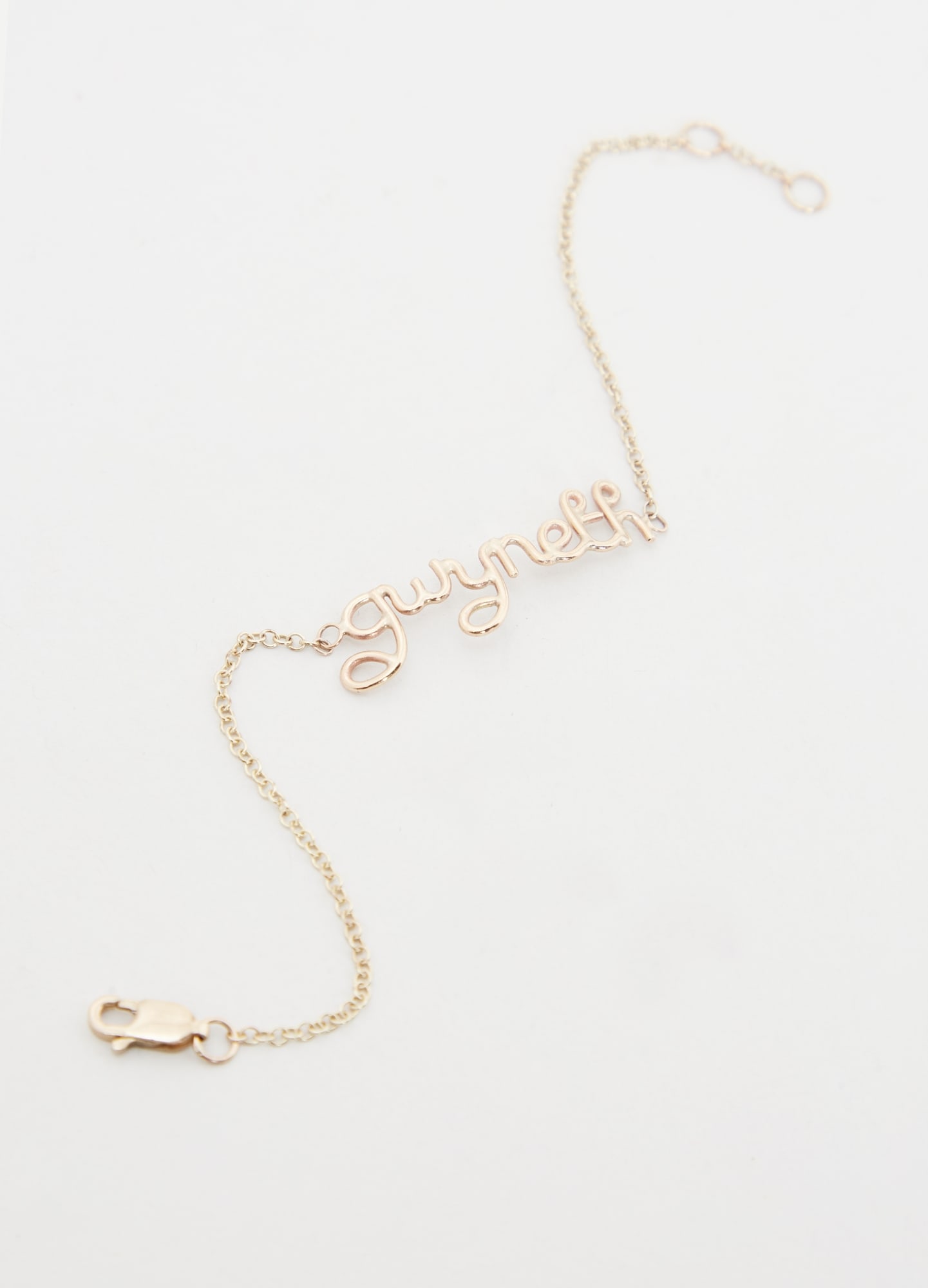 Gwyneth Paltrow | 9k Yellow Gold gwyneth Bracelet: 9k yellow gold “gwyneth” bracelet from the collection of Gwyneth Paltrow.The bracelet features a polished cursive “gwyneth” centerpiece set on a fine-link chain. Mark