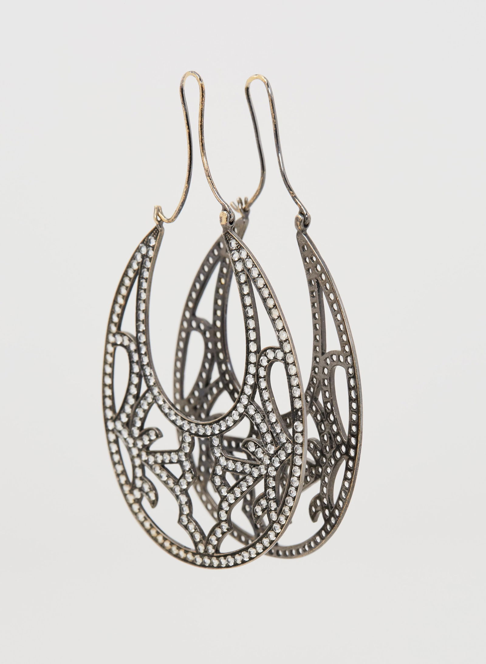 Gwyneth Paltrow | Ear Pendants: A pair of costume ear pendants from the collection of Gwyneth Paltrow.Each earring features an openwork, simulated diamond–set hoop suspended from gold-plated hooks, designed for pierced ears. N