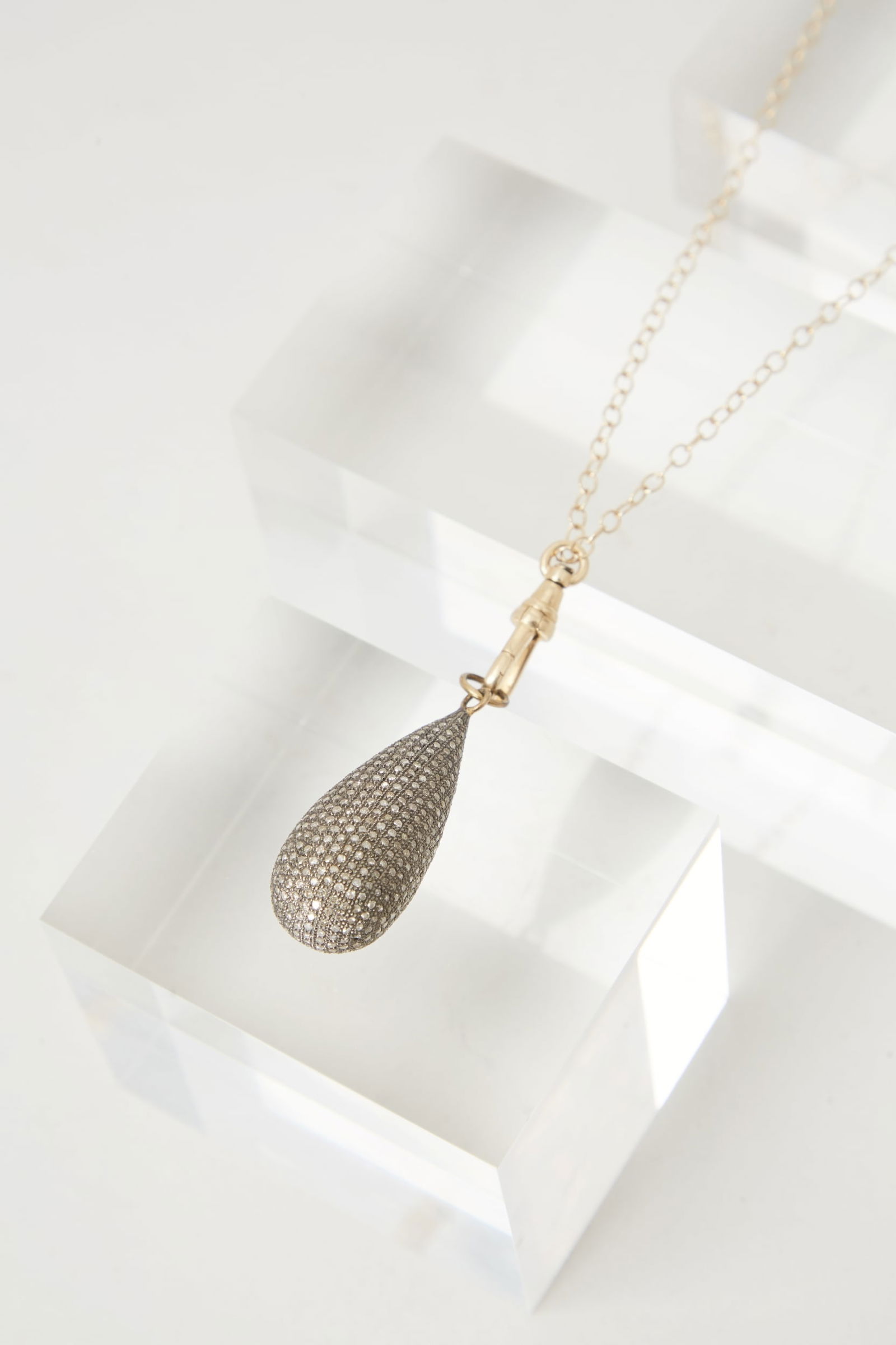 Gwyneth Paltrow | Lera Jewels Gold and Diamond Pendant Necklace: Lera Jewels, Sterling Silver, 14K Yellow Gold and Diamond Pendant Necklace from the collection of Gwyneth Paltrow.The pendant is a pavé-set diamond drop, mounted in sterling silver topped with 14