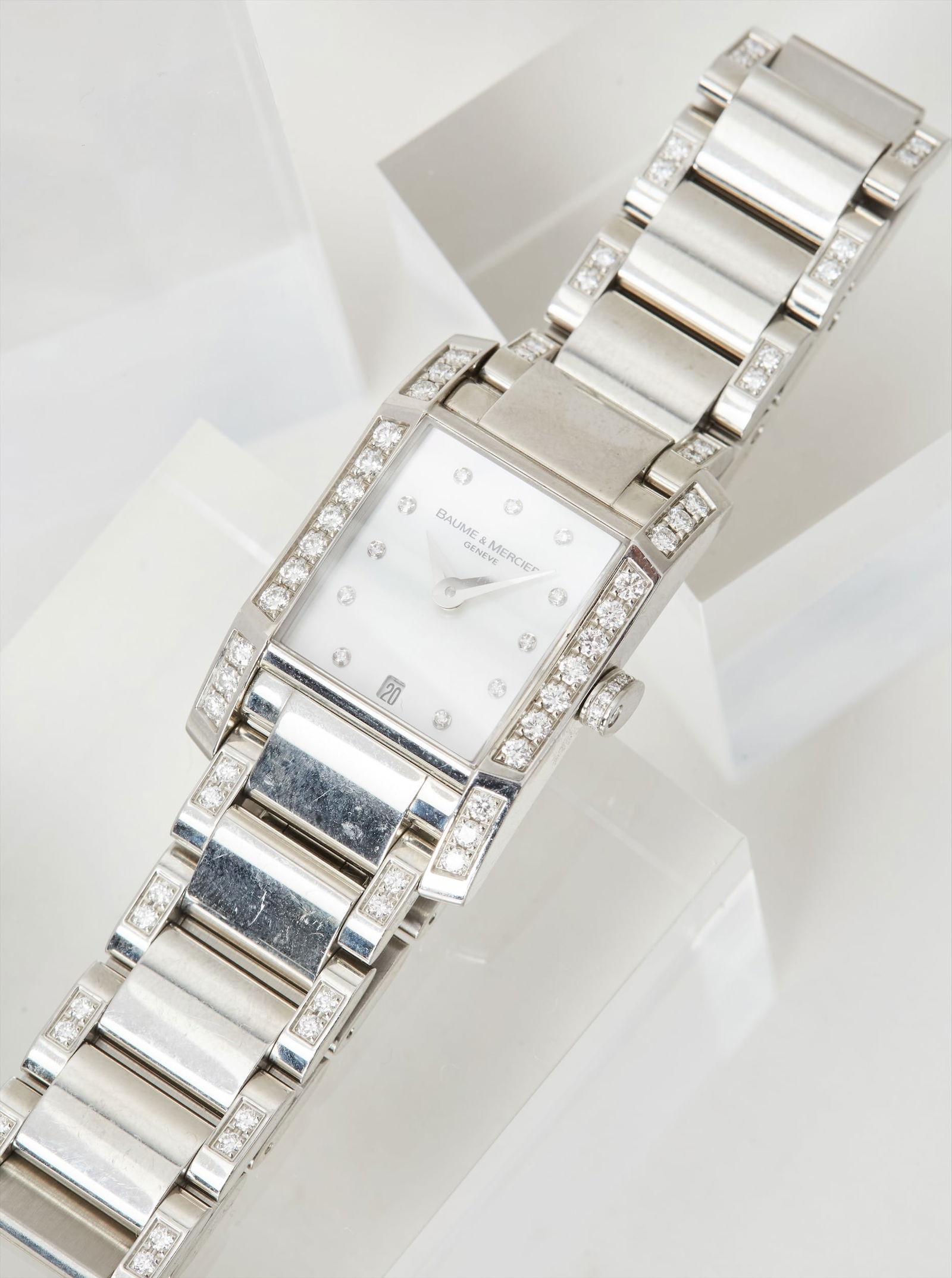 Gwyneth Paltrow | BAUME & MERCIER Stainless Steel Automatic “Hampton” Wristwatch: BAUME & MERCIER, stainless steel automatic “Hampton” wristwatch from the collection of Gwyneth Paltrow.The watch features an automatic movement and a rectangular mother-of-pearl dial with