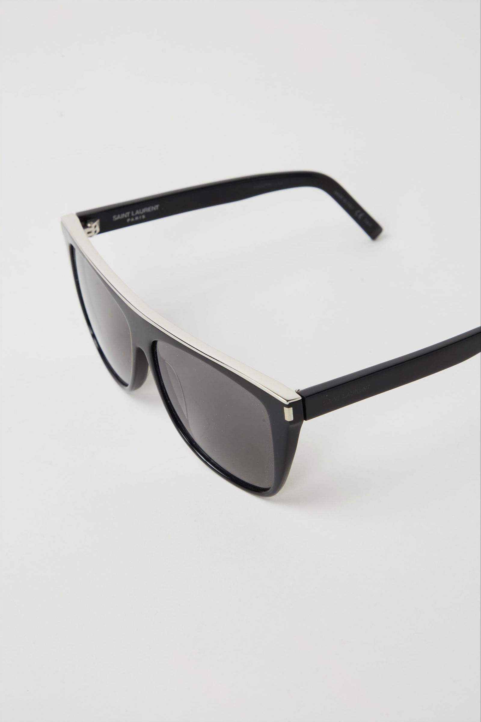 Gwyneth Paltrow | Saint Laurent Square Sunglasses: Saint Laurent black square sunglasses from the collection of Gwyneth Paltrow. Lens color grey. Gwyneth Paltrow was the face of Saint Laurent by Anthony Vaccarello’s Spring 2025 ca