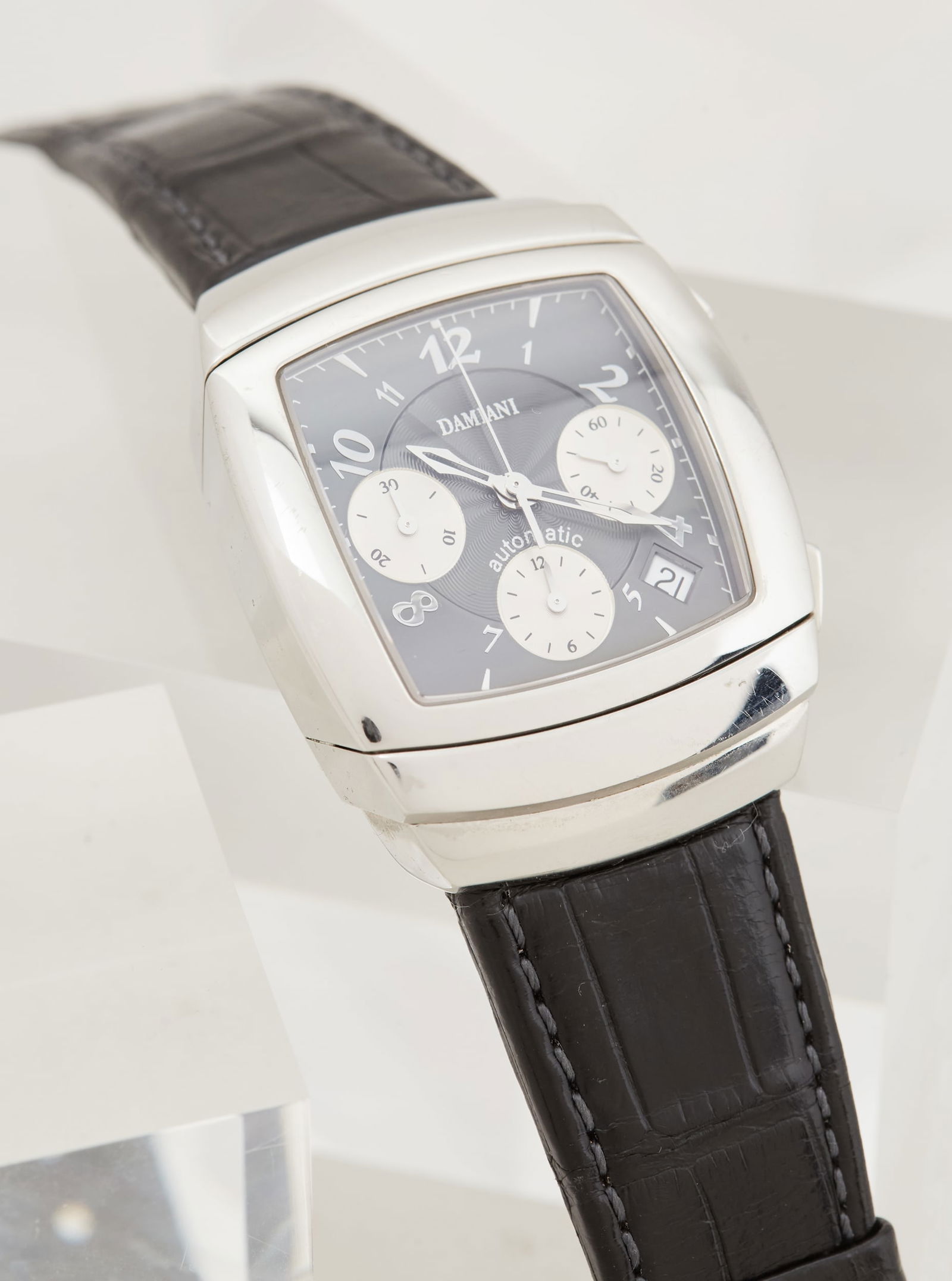 Gwyneth Paltrow | DAMIANI Stainless Steel Ego Chronograph Wristwatch: DAMIANI, stainless steel “Ego Chronograph” personalized wristwatch from the collection of Gwyneth Paltrow.Featuring an automatic mechanical movement, the cushion-shaped grey engine-turned