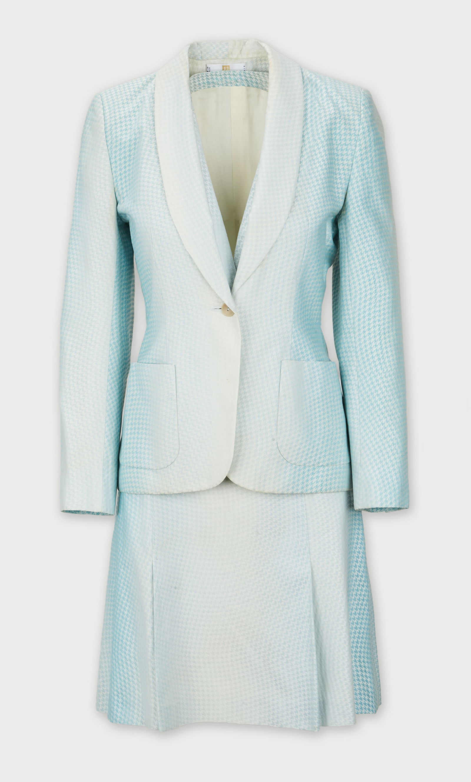 Givenchy | 1999 Spring Summer Collection by Alexander McQueen Three Piece Suit: A Givenchy three-piece skirt suit designed by Alexander McQueen for the 1999 spring runway collection titled “Saint-Germain-Des-Pres, 1960s.”The suit on the runway was outfitted with just