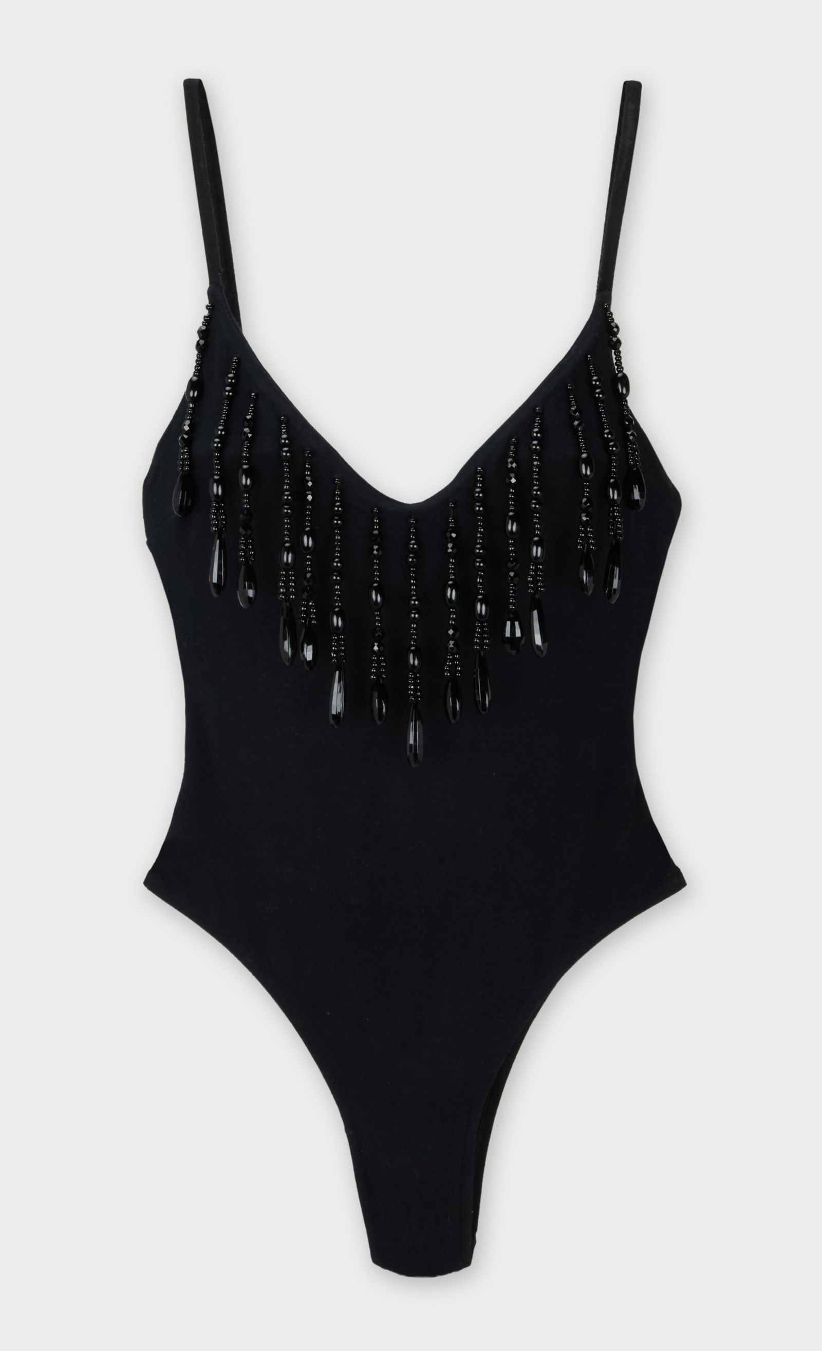 Dolce and Gabbana | 1991 Bodysuit with Beaded Fringe: Dolce & Gabbana 1991 bodysuit with beaded fringe.Black cotton-blend bodysuit featuring a scoop neckline with embellished beaded fringe and a low-cut back. Size 46. Made in Italy.Dolce & Gabbana was
