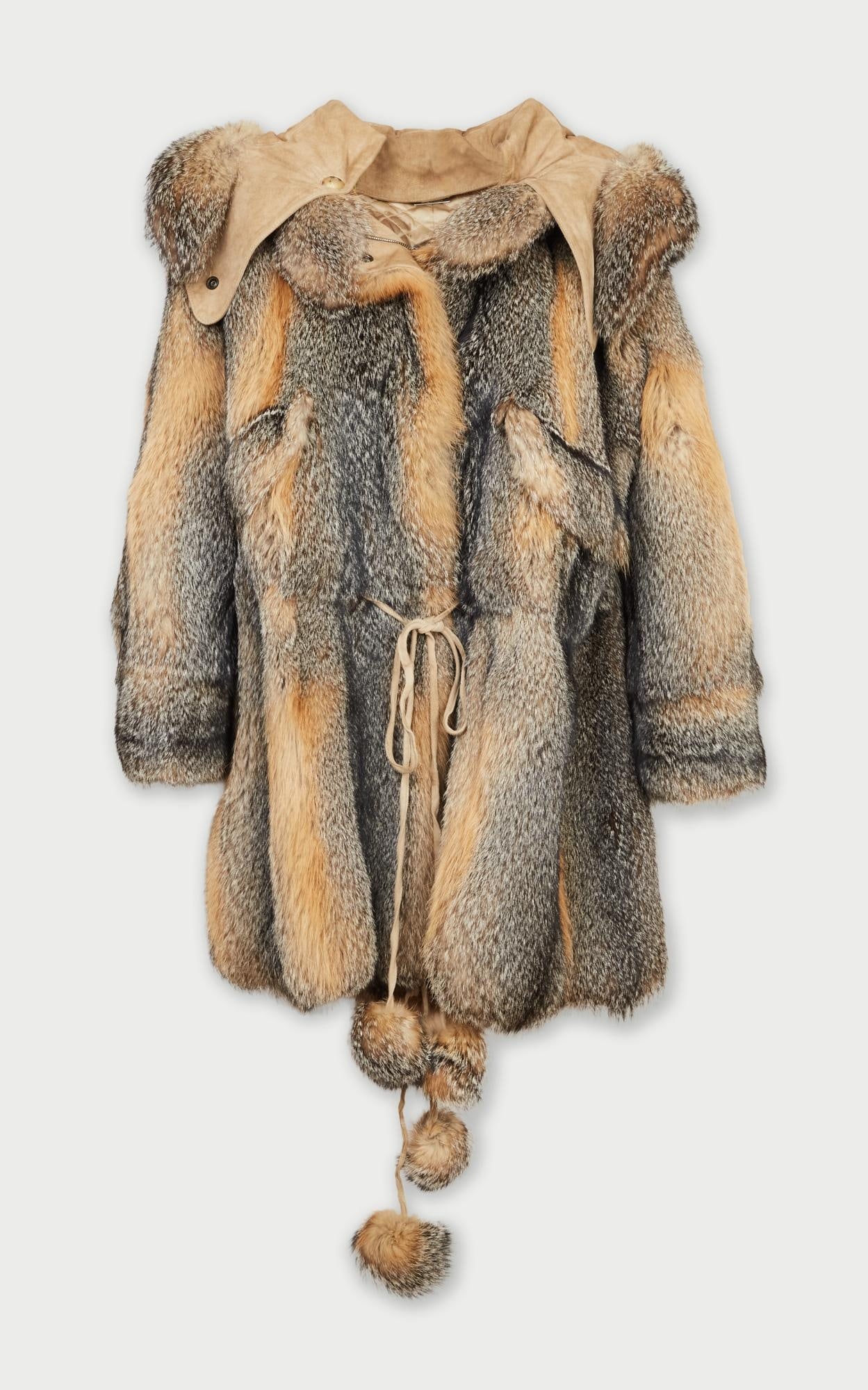 Alexander McQueen | 2006 Fall Runway Fur Coat: This an Alexander McQueen coyote fur coat from the fall 2006 runway collection.The nomadic-style design is an oversize fit with a detachable hood, a drawstring waist, and a drawstring hemline. The
