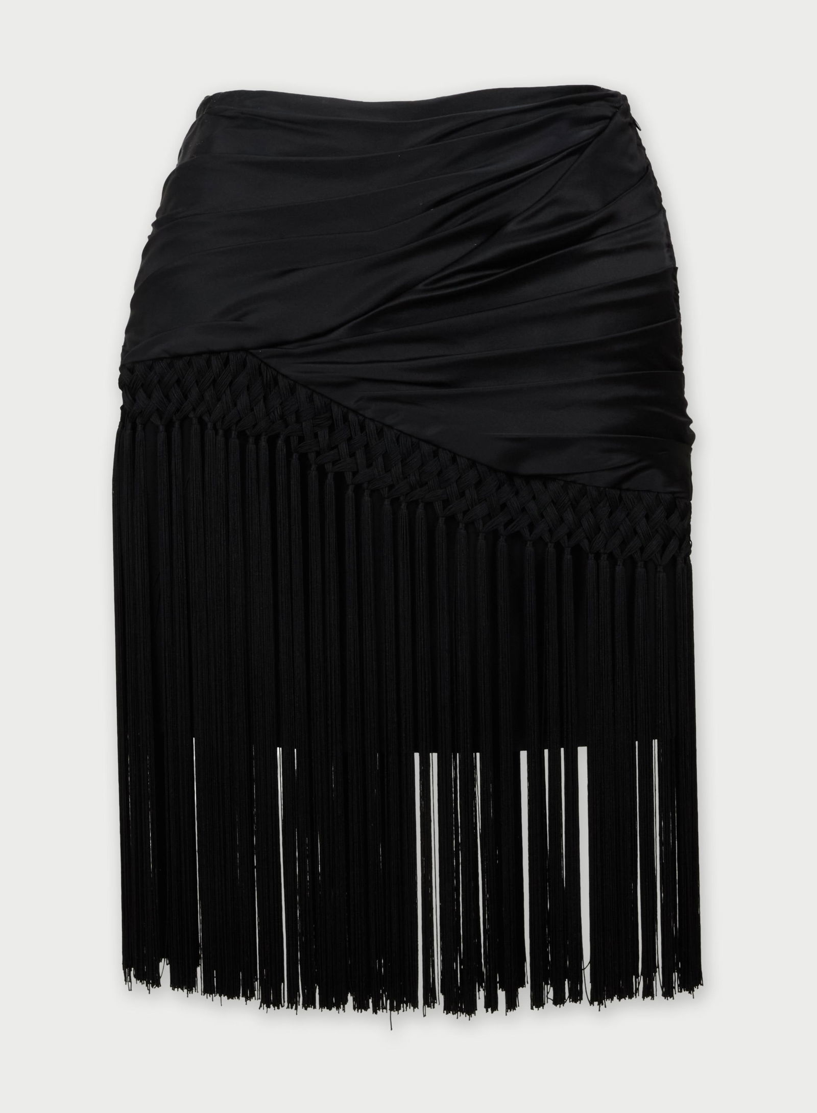 Escada | Fringe Skirt: A fitted Escada high-waisted skirt composed of black silk gathered asymmetrically, overlayed with knotted fringe. Long fringe trim extends past the hem. The skirt includes a hidden zip