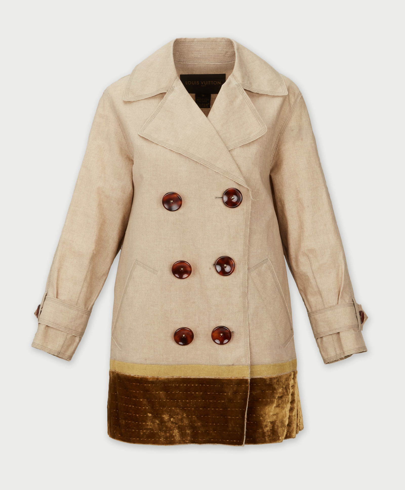 Louis Vuitton | Linen Trench Coat: Louis Vuitton linen trench coat.A loose-cut tan double-breasted jacket featuring a classic pointed collar, waist-level front pockets, and a front button closure with front tonal brown buttons.