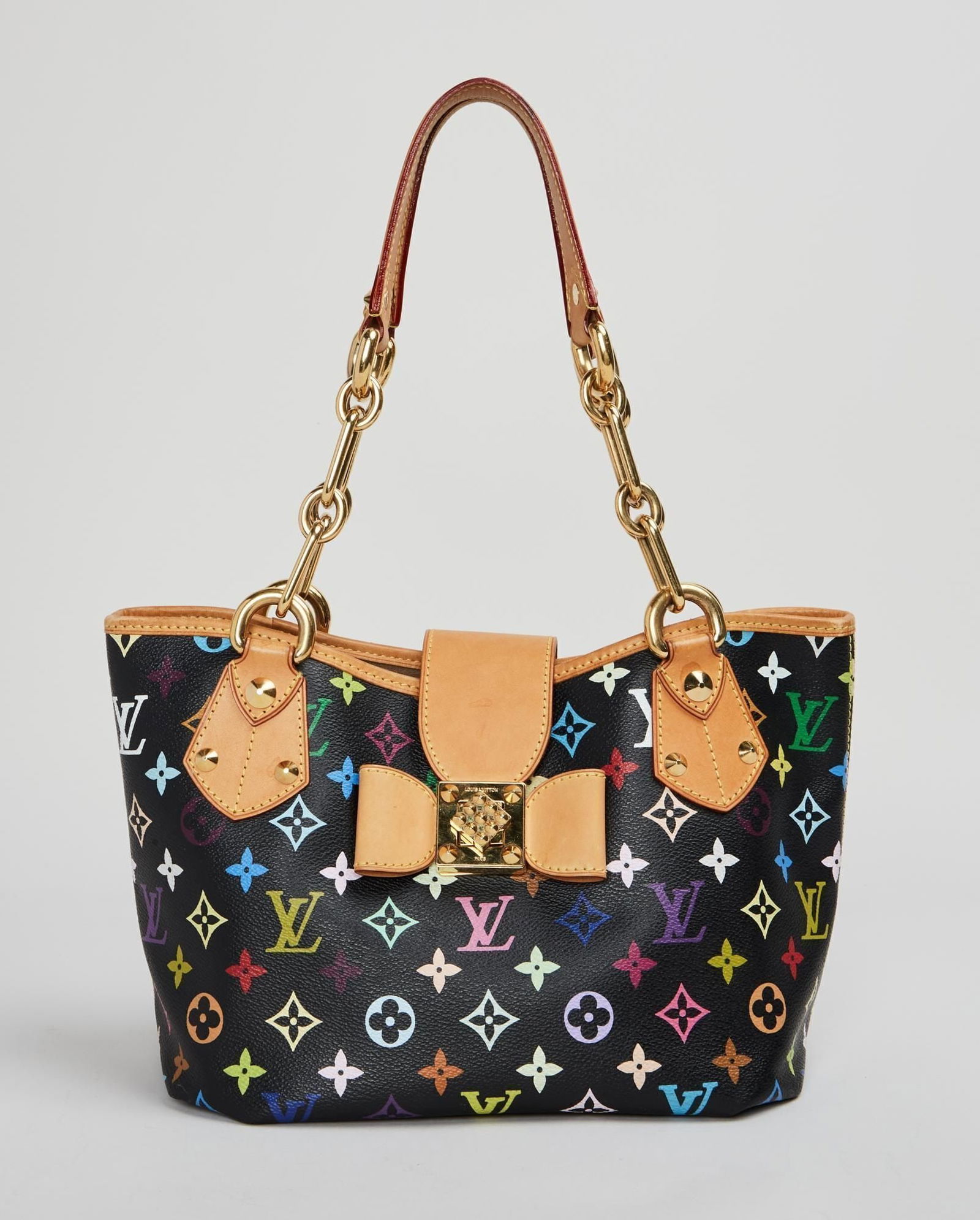 Louis Vuitton | 2010 Takashi Murakami Donna MM Monogram Bag: A Louis Vuitton 2010 Takashi Murakami monogram black and multi-color Donna MM bag, designed during Marc Jacobs's tenure as creative director. The bag is painted monogram canvas with multi-color