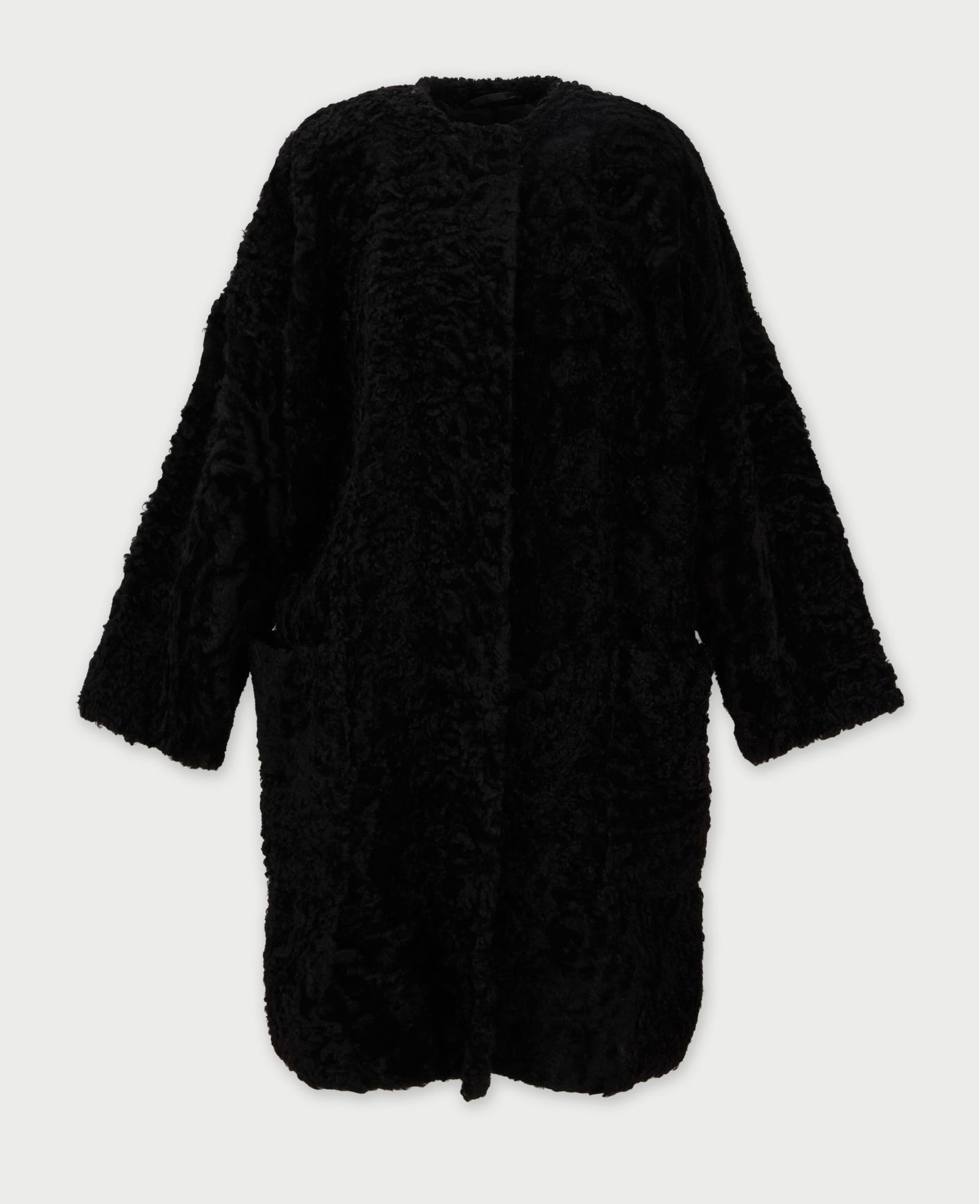Gianfranco Ferré | Overcoat: Gianfranco Ferré overcoat.Black shearling sherpa coat featuring two hidden front clasps and two hip pockets. Fully lined in black viscose rayon. Made in Italy.Gianfranco Ferré, known as