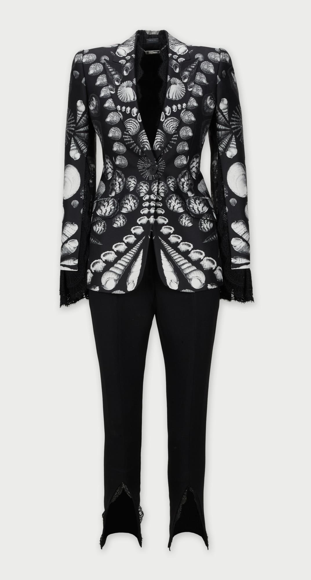 Alexander McQueen | 2019 Pre-Spring Collection By Sarah Burton Seashell Print Blazer and Pant: Alexander McQueen Seashell print blazer and pants ensemble from the 2019 Pre-Spring collection.The ensemble is crafted from a wool silk blend fabric. The tailored black blazer with a sharp, structured