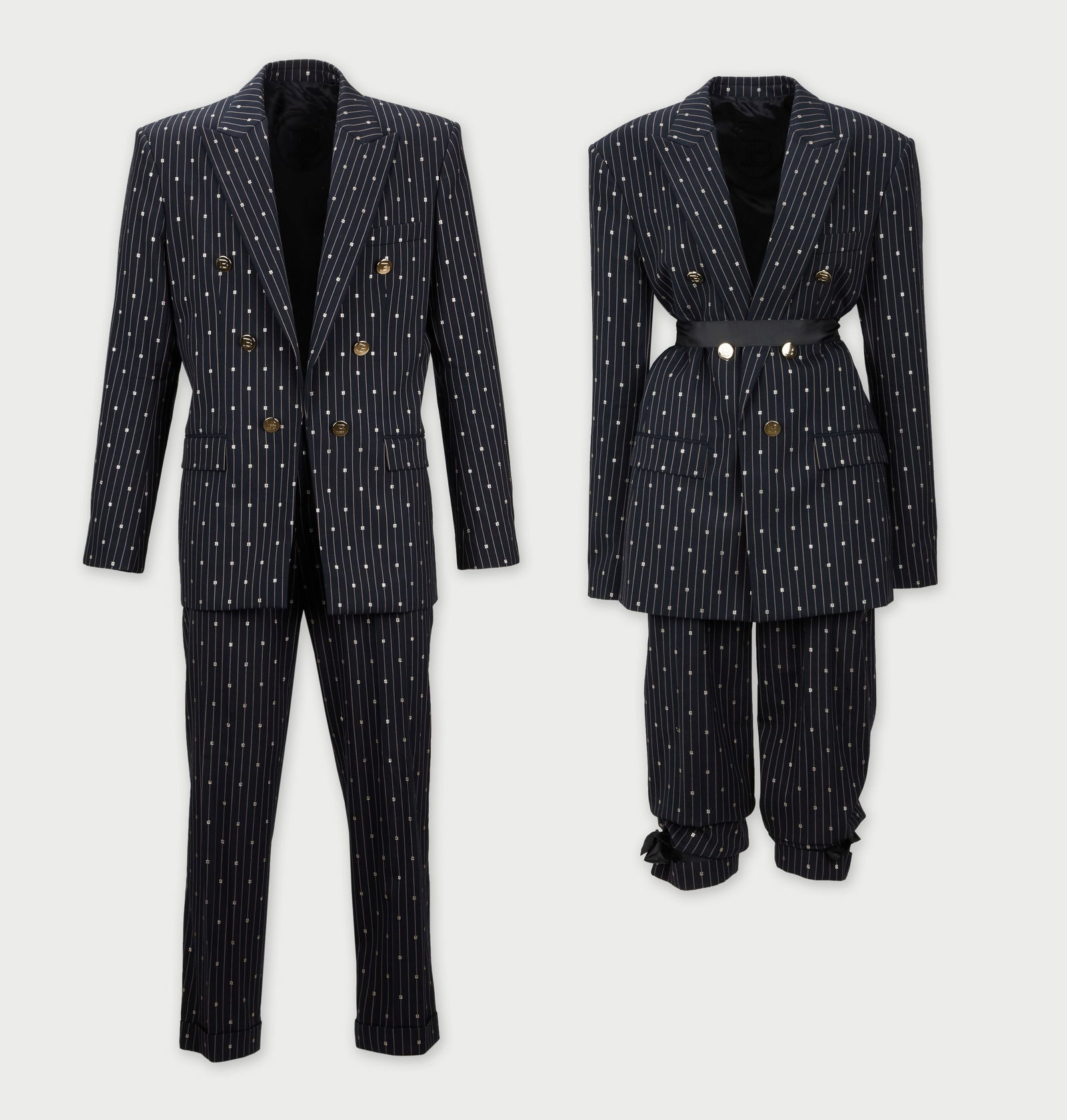Balmain Paris | Suit Jacket and Trousers: A double-breasted suit jacket and tailored trouser ensemble designed by Balmain Paris, from the collection of Cameron Silver. Crafted in navy wool, the fabric features white pinstripes accented w