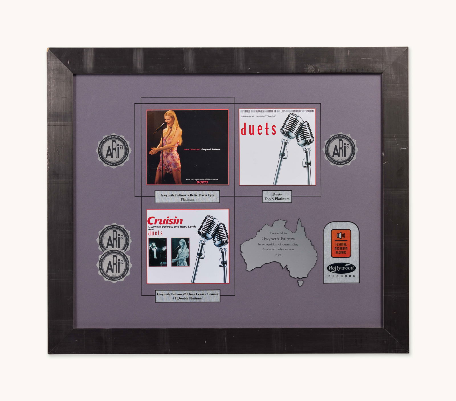 Gwyneth Paltrow | 2001 Duets Australian Platinum Record Award: “Duets” Australian Platinum Record Award from the collection of Gwyneth Paltrow. From Festival Mushroom Records and Hollywood Records. Presented to Gwyneth Paltrow in 2001 in recognit