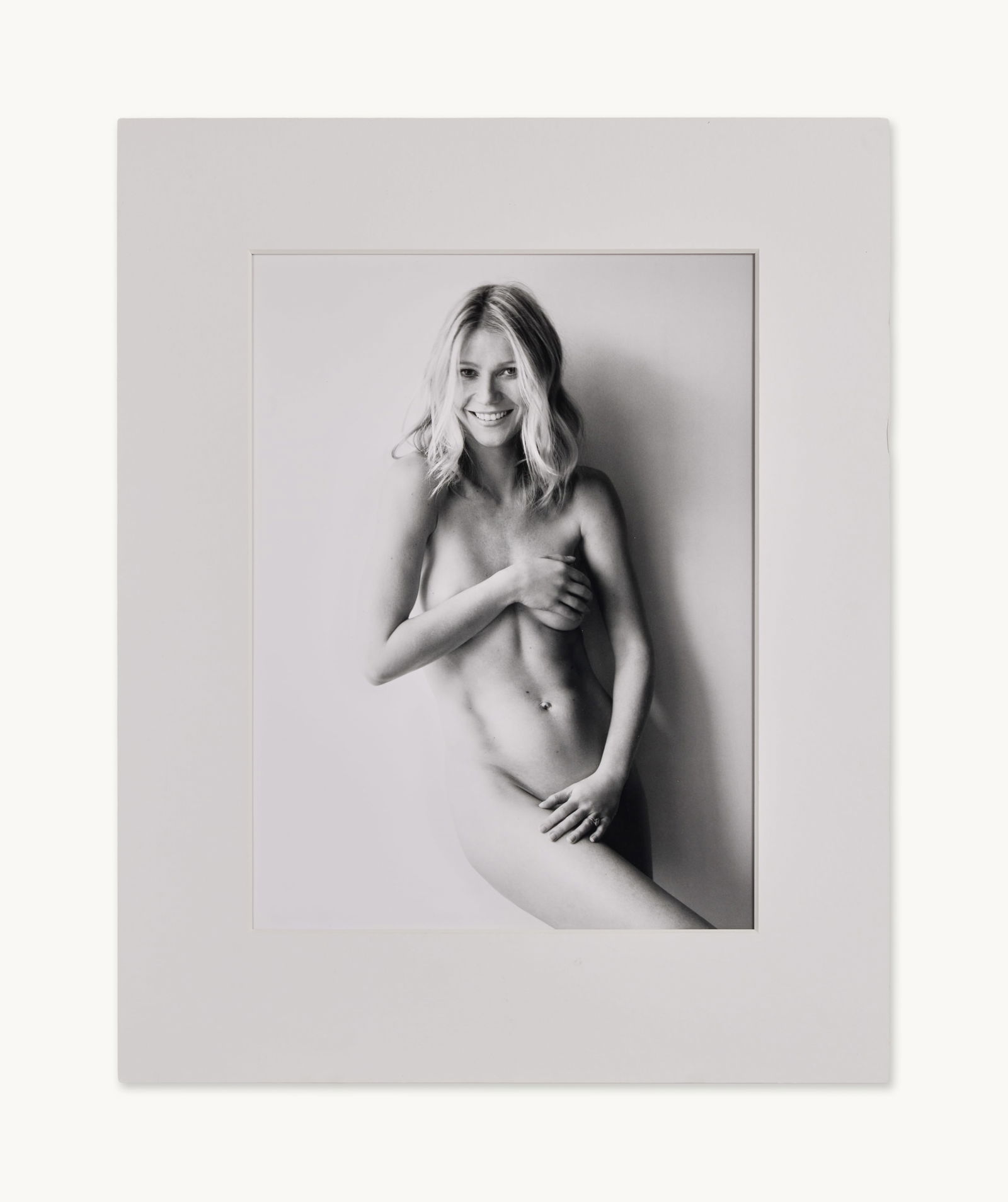 Gwyneth Paltrow | 2008 Signed Mario Testino Photograph Portrait: A 2008 signed Mario Testino three-quarter length nude black and white photograph portrait of Gwyneth Paltrow. On the back of the photograph located on the bottom right-hand corner is Mario Testino han