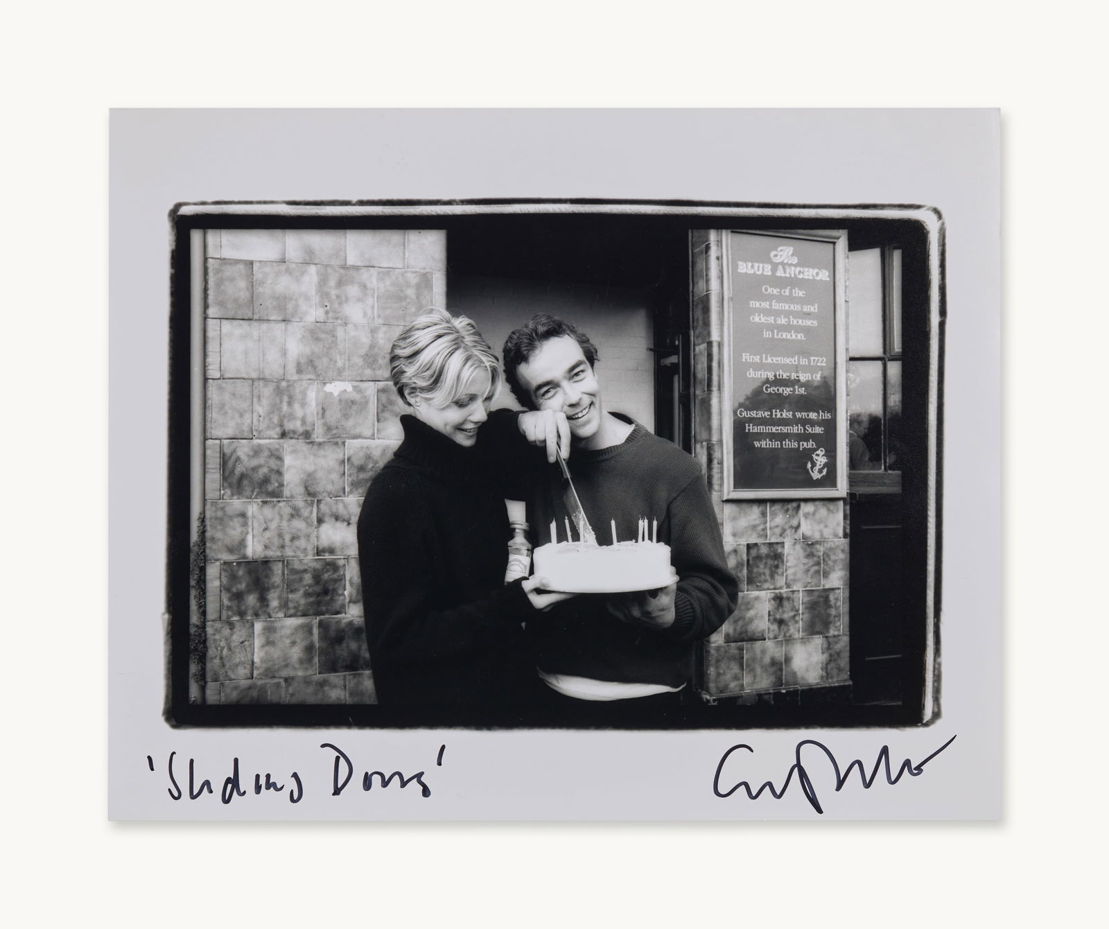 Gwyneth Paltrow | Signed Set Photographs (7): A set of photographs of Gwyneth Paltrow on the set for films Sliding Doors and A Perfect Murder. One image is with John Hannah, signed by Paltrow. Taken at The Blue Anchor, one of London
