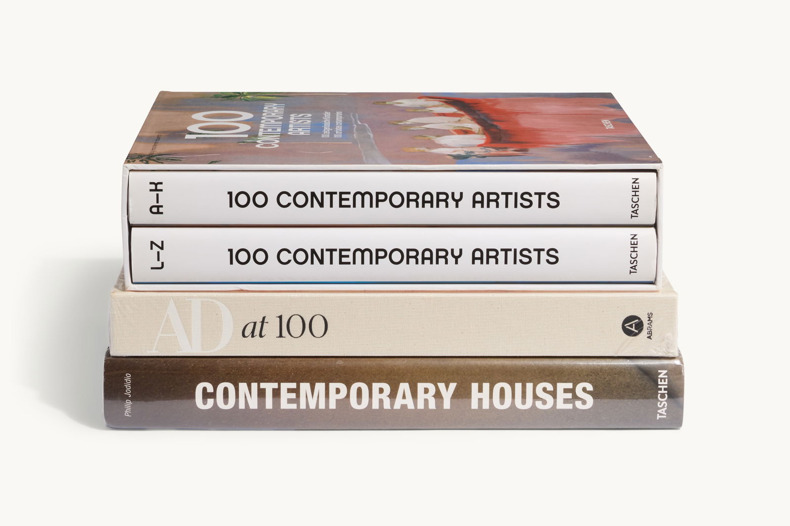 Gwyneth Paltrow | Group of Three Art and Architecture Themed Books: Three books on art and architecture including Hans Werner Holzwarth ed. 100 Contemporary Artists (Cologne: Taschen 2009); Amy Astley ed. AD at 100: A Century of Style (New York: Abrams 2019); and Phil