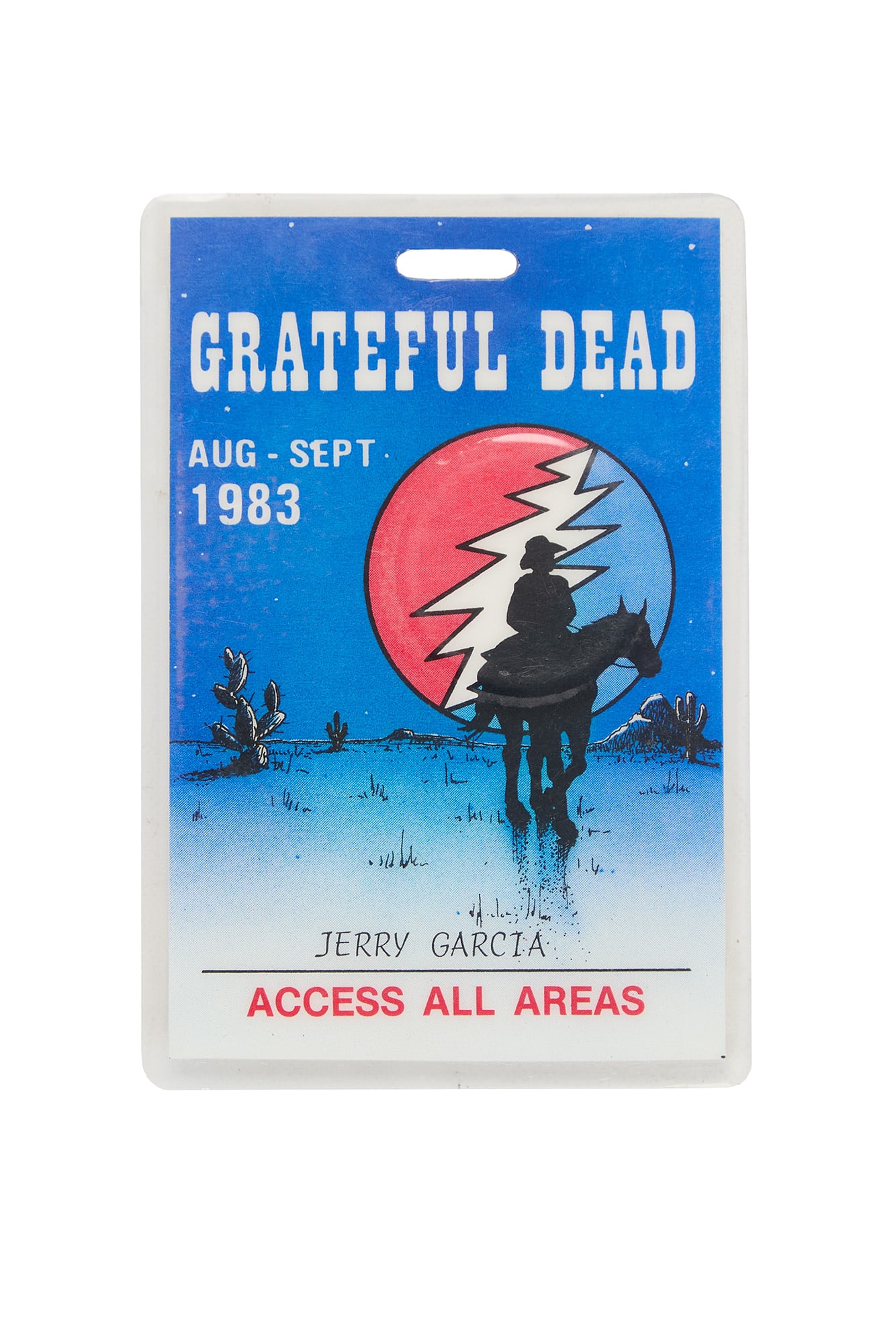 Jerry Garcia | 1983 Laminated All Access Pass: A laminated all access Grateful Dead pass for August-September of 1983 issued to Jerry Garcia featuring a western cowboy graphic with the "Steal Your Face" logo as the moon that reads