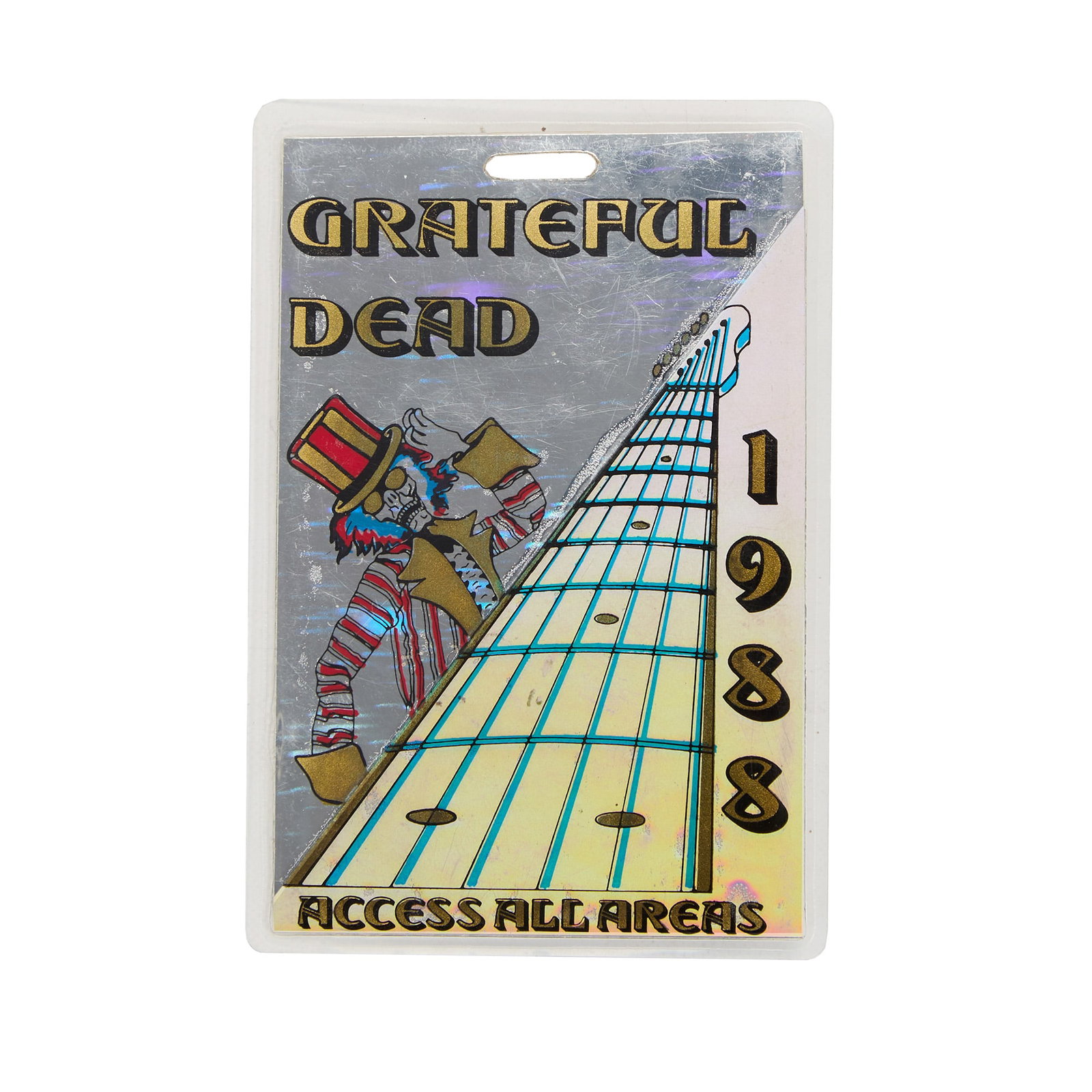 Jerry Garcia | 1988 Laminated All Access Pass: A laminated all access pass to a 1988 Grateful Dead concert issued to Jerry Garcia featuring a guitar neck and Uncle Sam skeleton graphic. The back of the pass reads "Employee Identification - Na