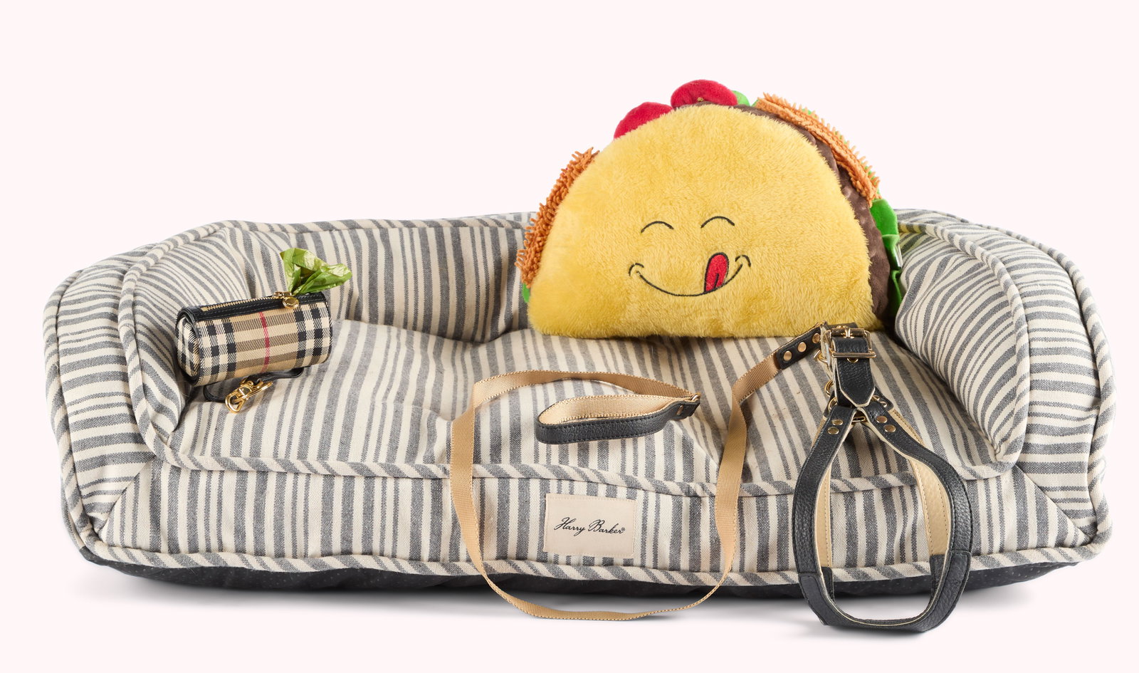 And Just Like That... | ?Richard Burton's? Dog Beds, Party Hat, and Ephemera: Two dog beds, a custom party hat, and a collection of ephemera relating to Charlotte's bulldog "Richard Burton," from the production of And Just Like That? (2021 - 2025). One of the dog beds is Barbou