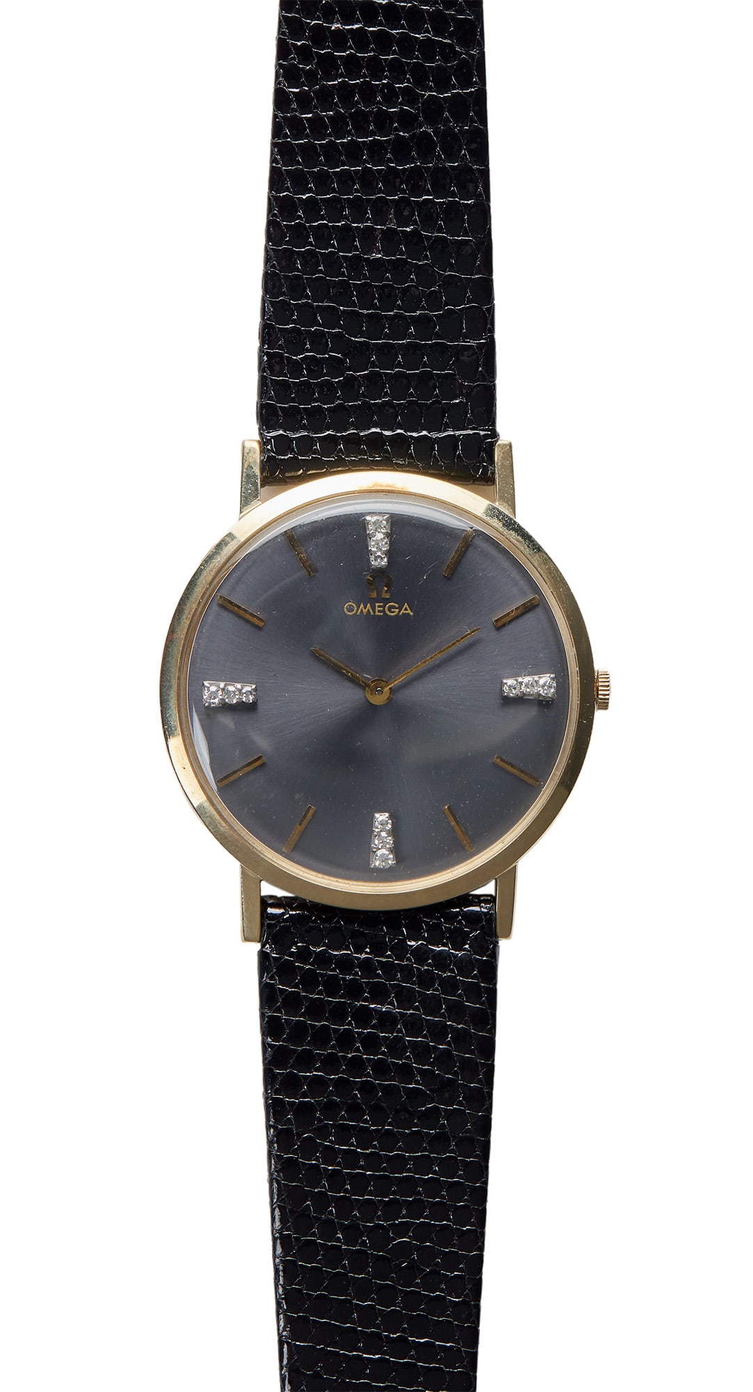 Jerry Weintraub | Omega 14K Yellow Gold and Diamond Quartz Wristwatch: Quartz movement, the grey circular dial, gold baton and single-cut diamond chapters and gold hands, within a 14k yellow gold case, joined to a black leather strap, 31 mm case, the verso inscribed, "FR