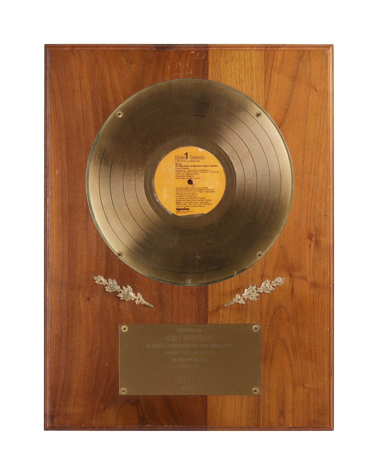 Jerry Weintraub | Elvis Presley "As Recorded at Madison Square Garden" RIAA Gold Record Award: An in-house appreciation plaque presented to Jerry Weintraub in sincere appreciation for his contribution towards sales in excess of one million dollars of the live album Elvis As Recorded at Madison