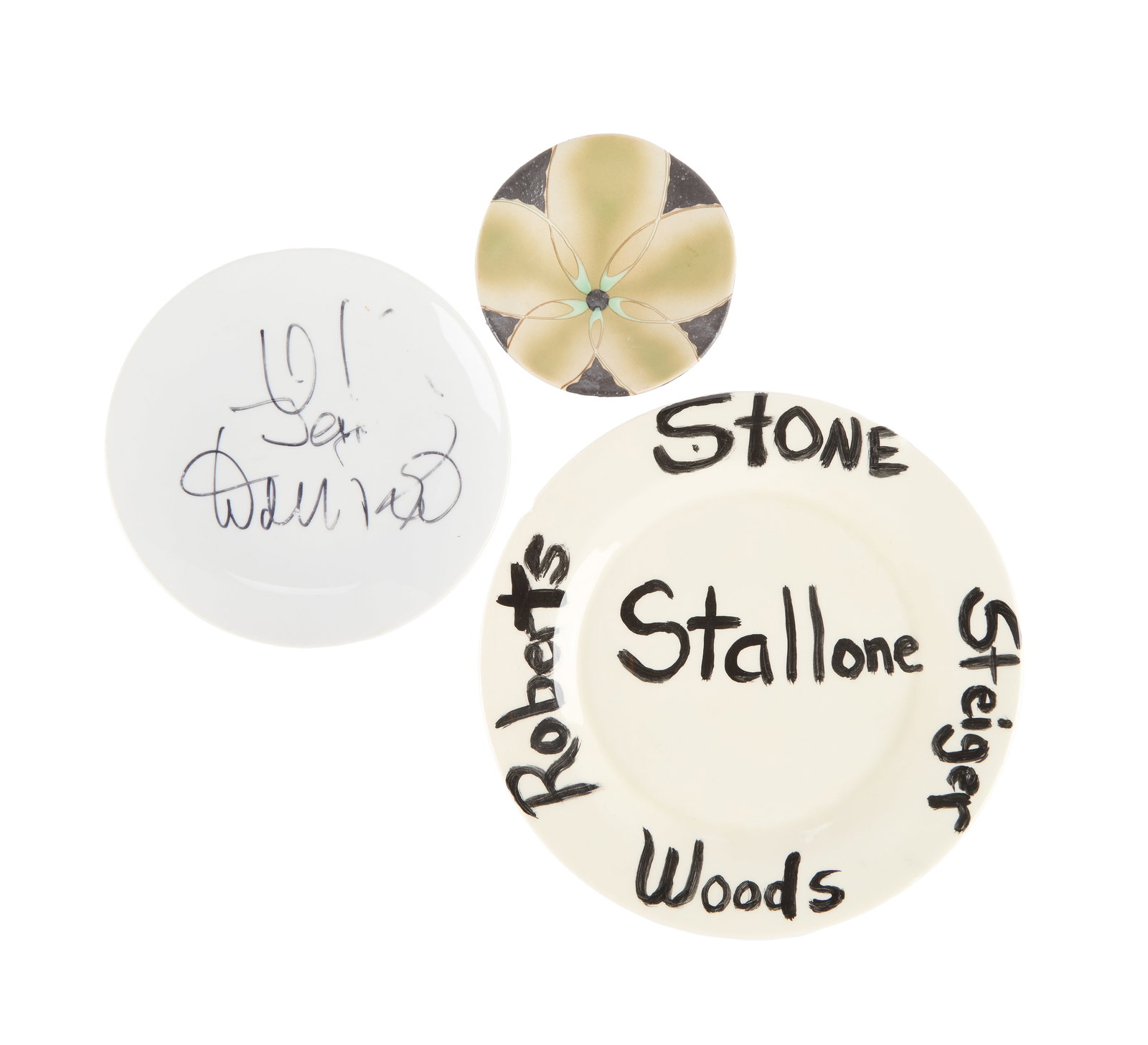 Jerry Weintraub | Group of Personal and Decorative Items: A group of personal and decorative items from the collection of Jerry Weintraub, including:Three plates, one with a flower design, one with Jerry Weintraub's signature (parts missing), and one