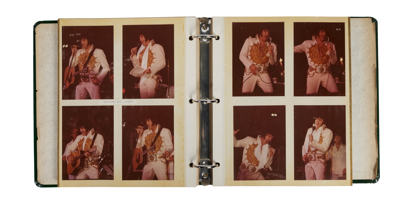 Elvis Presley | Photo Album of Professional and Unpublished Photos: A large photo album containing approximately 165 professional and unpublished photographs of Elvis Presley performing on stage, c. 1970s. The photos are housed in a green leather photo album.&nb