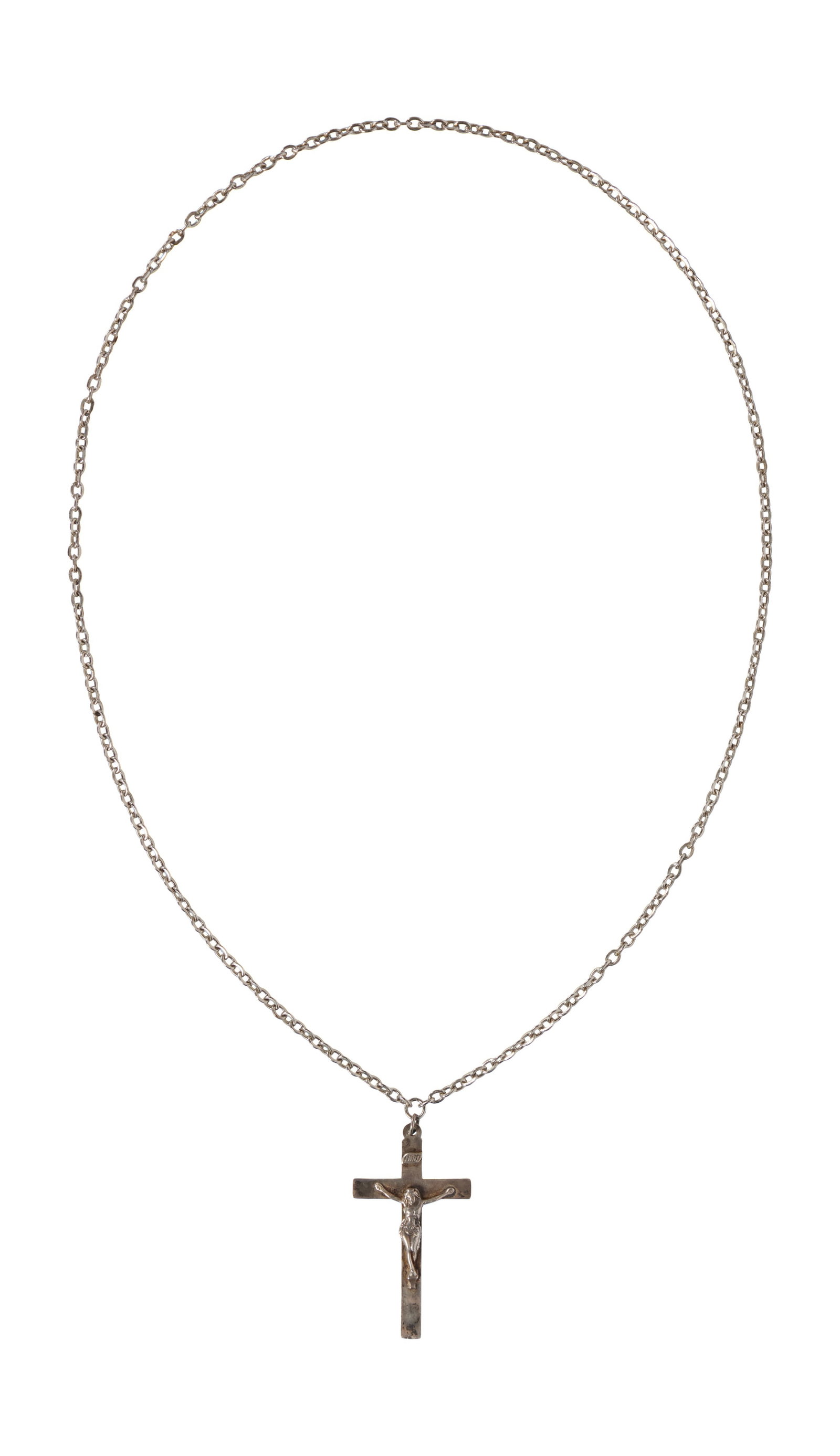 Elvis Presley | Sterling Silver Crucifix Necklace: A sterling silver crucifix pendant, suspended by a fine-link sterling silver necklace, owned by Elvis Presley. Crucifix and necklace both marked "Sterling." Accompanied by a Letter of Authentici