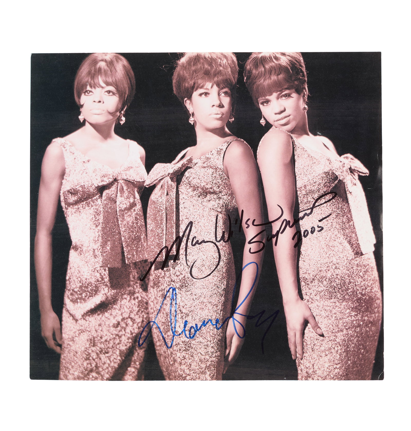 The Supremes | Signed Photo: An oversized photograph of the Supremes, signed by Mary Wilson and Diana Ross and dated "2005" in black and blue marker. Accompanied by a Certificate of Authenticity from Roger Epperson