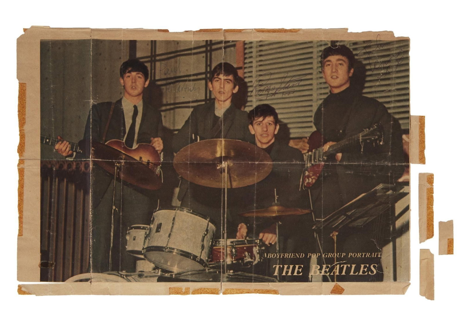 The Beatles | Signed 1963 Magazine Page: A double page taken from the May 1963 issue of Boyfriend Magazine featuring a color photograph of The Beatles, signed by Paul McCartney John Lennon, and Ringo Starr in ink. The back of the page 