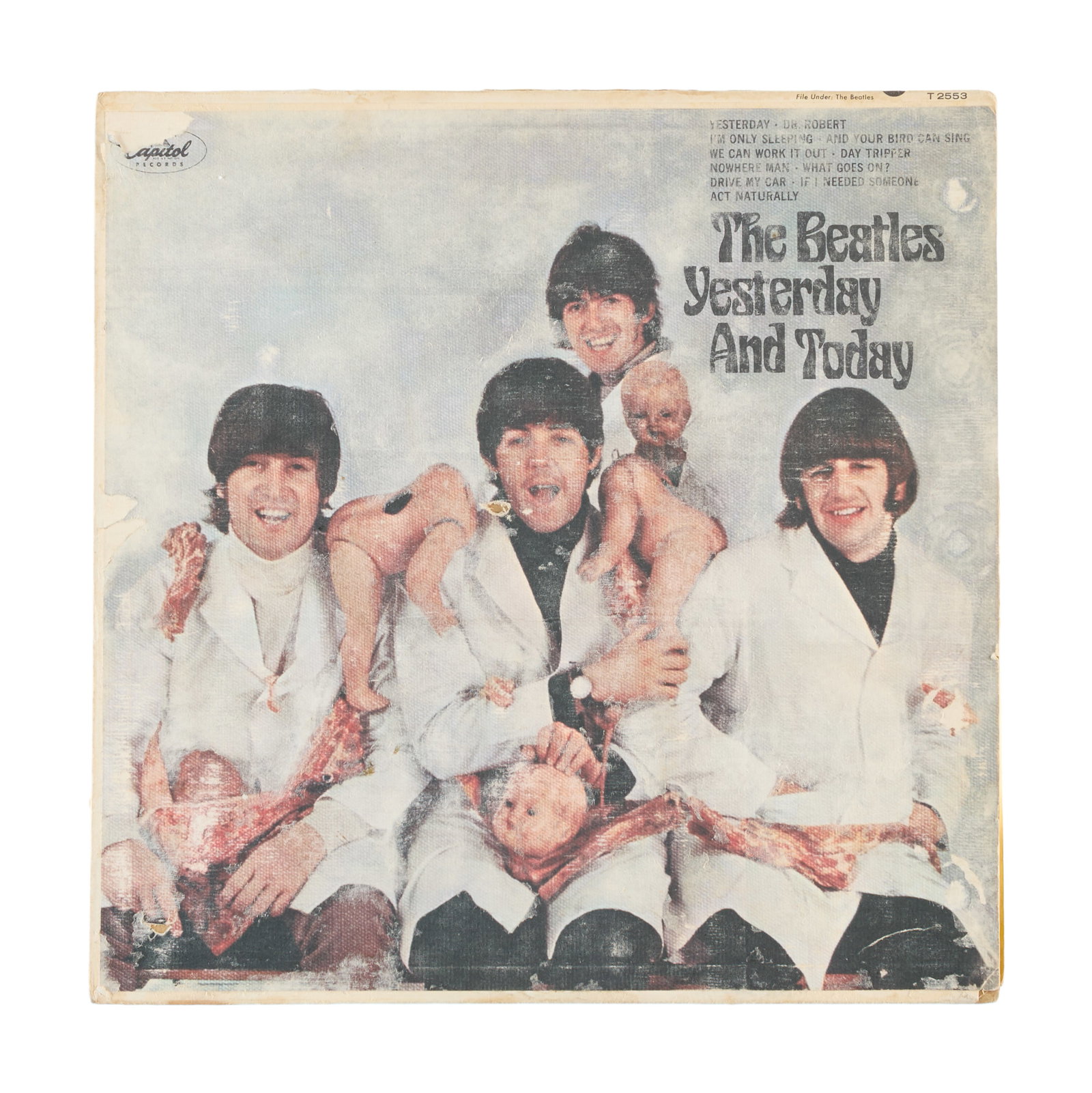 The Beatles | 1966 Butcher Cover "Yesterday And Today" Record Album (Third State): A third state (peeled) "butcher" cover copy of the 1966 Beatles record album, Yesterday and Today, featuring the scandalous and quickly-withdrawn artwork that depicted the band covered in chopped meat