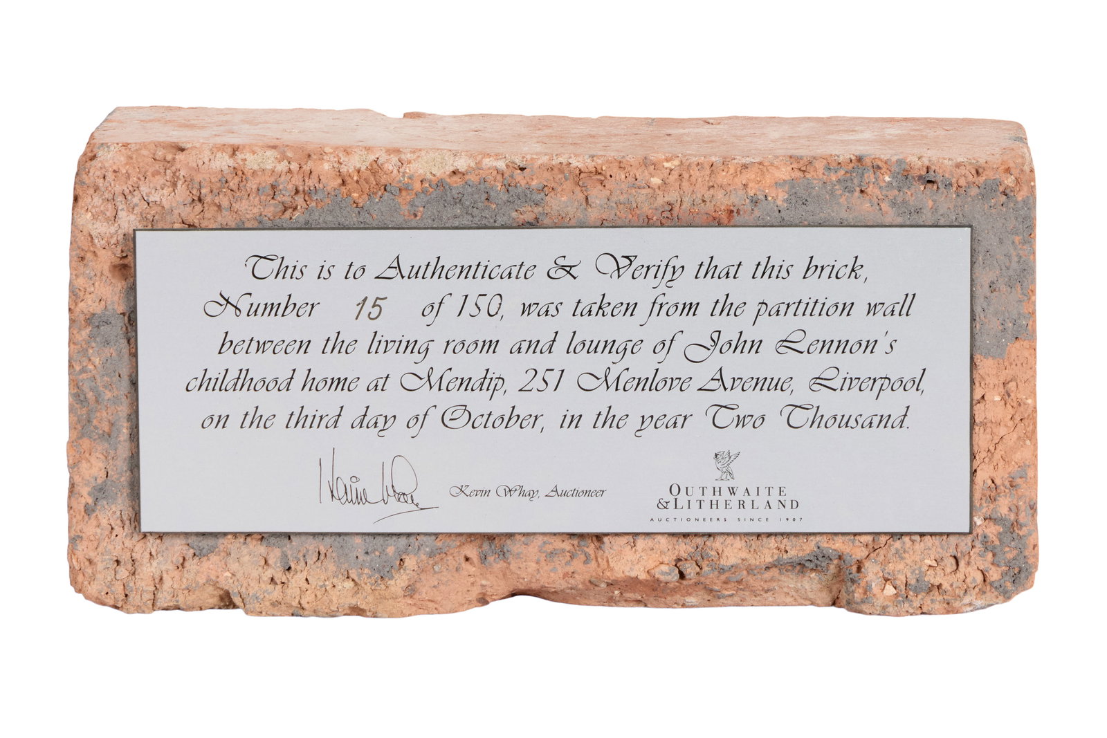 John Lennon | Brick From John Lennon's Childhood Home in Mendips Liverpool: A brick from John Lennon's childhood home in Mendips, Liverpool, England. There is a plaque affixed to the top which reads "This is to Authenticate & Verify that this brick, Number 15 of 150, was