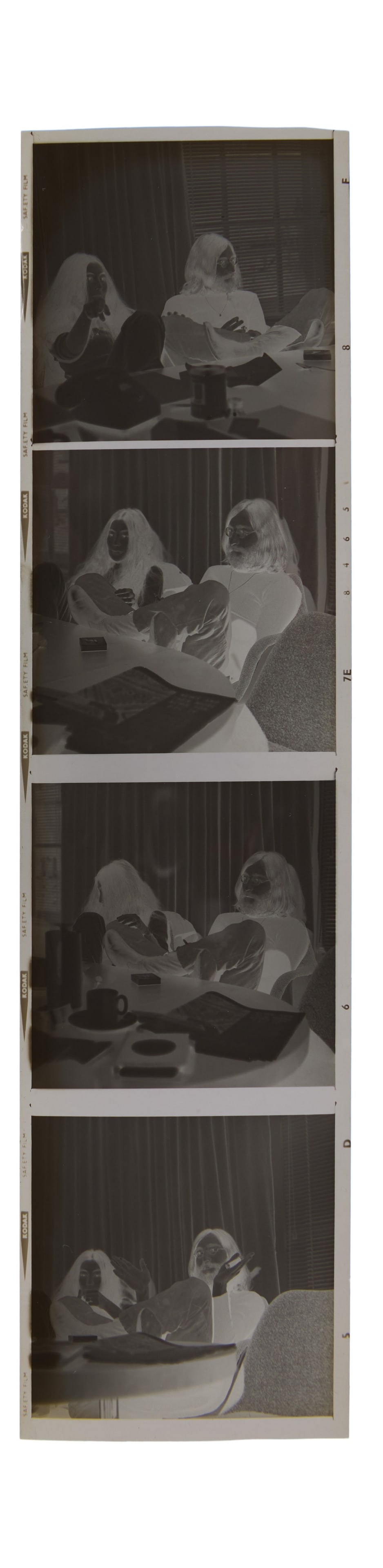 John Lennon and Yoko Ono | 1969 Apple Savile Row Negatives With Copyright: A collection of four black and white medium format negatives of John Lennon and Yoko Ono. The images were taken in the Apple offices at Savile Row in June 1969. The negatives are sold with full 