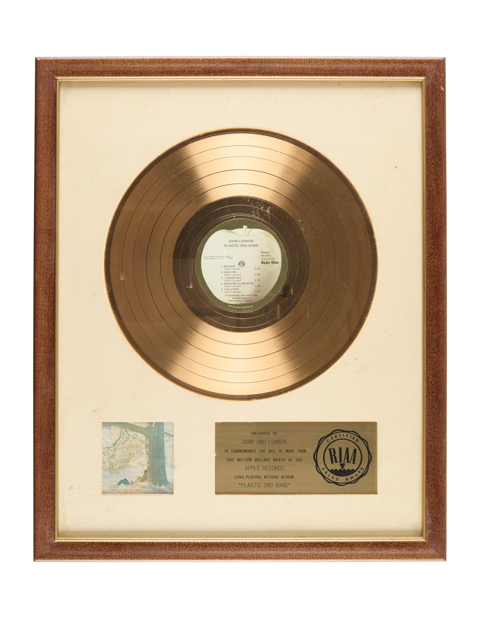 John Lennon | Plastic Ono Band RIAA Gold Album Award: An RIAA Gold Album for Plastic Ono Band presented to John Lennon to commemorate the sale of more than one million dollars worth of the Apple Records LP Plastic Ono Band. With verso white label printed