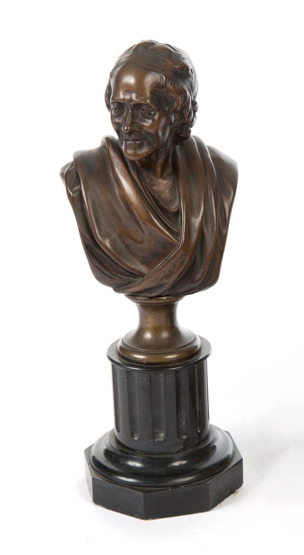 Ringo Starr | Bust of Voltaire, After Jean-Antoine Houdon: A patinated bronze portrait bust of Voltaire, after the model by Jean-Antoine Houdon (French, 1741-1828), from the collection of Ringo Starr and Barbara Bach. The bronze bust and socle are set on a ca