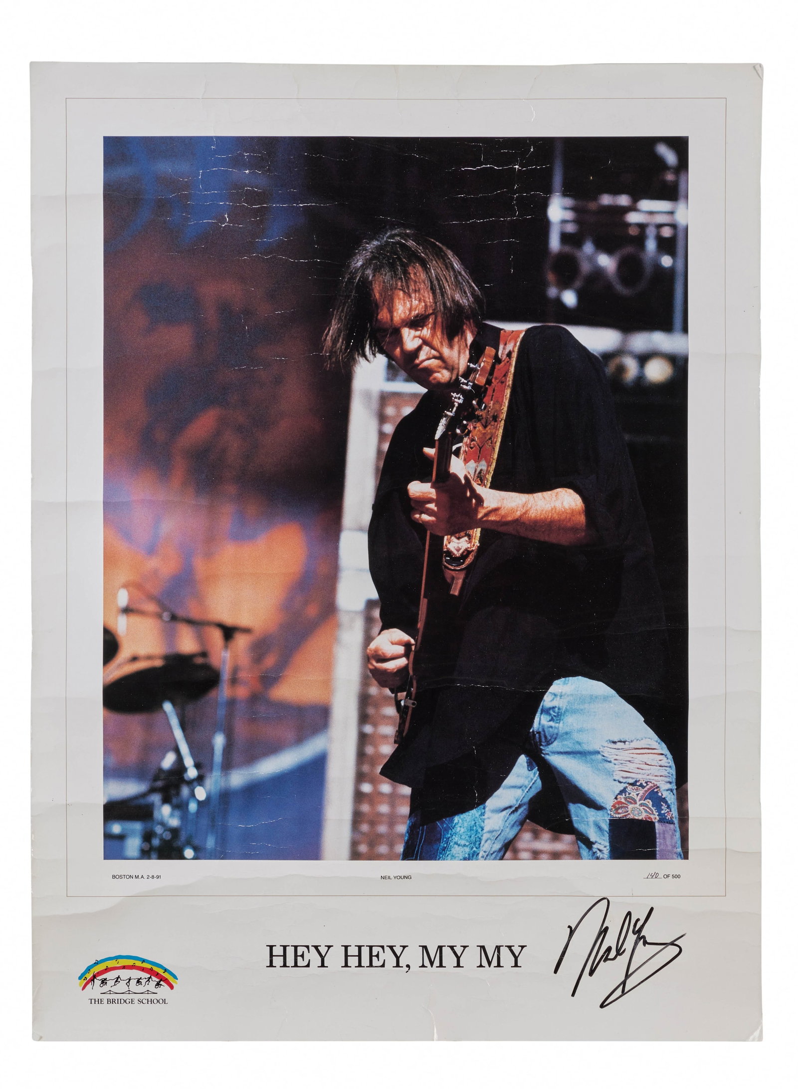 Neil Young | Signed "Hey Hey, My My" Limited Edition Lithograph: A limited edition Neil Young "Hey Hey, My My" lithograph autographed on the front by Neil Young numbered 140/500. These were sold to in 1995 to raise funds for Bridge School. The image of Neil was tak