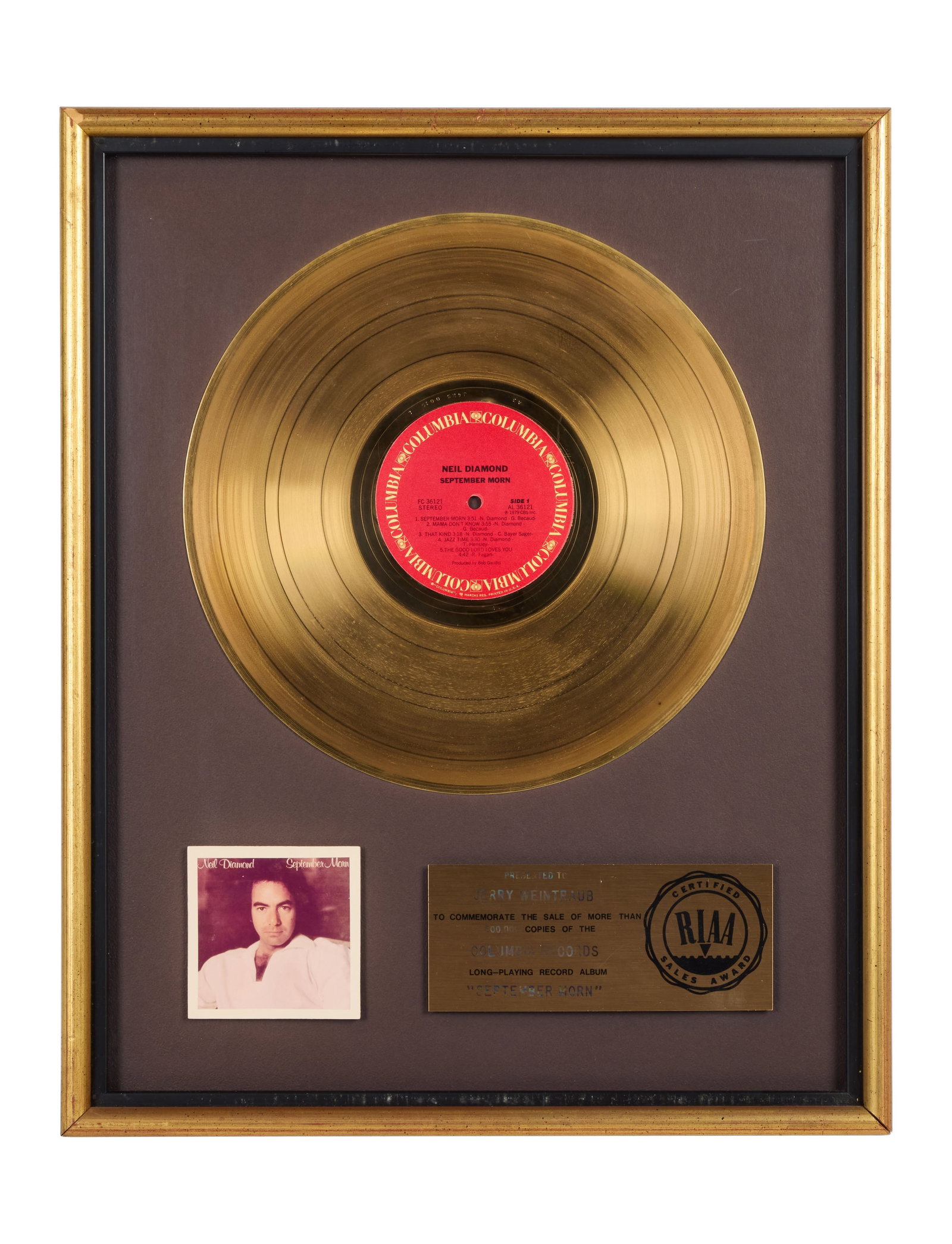 Neil Diamond | RIAA-Certified "Gold" Sales Award for "September Morn" Presented to Jerry Weintraub: An RIAA-Certified "Gold" Sales Award presented to concert promoter and producer Jerry Weintraub to commemorate the sale of more than 500,000 copies of Neil Diamond's long-playing record album