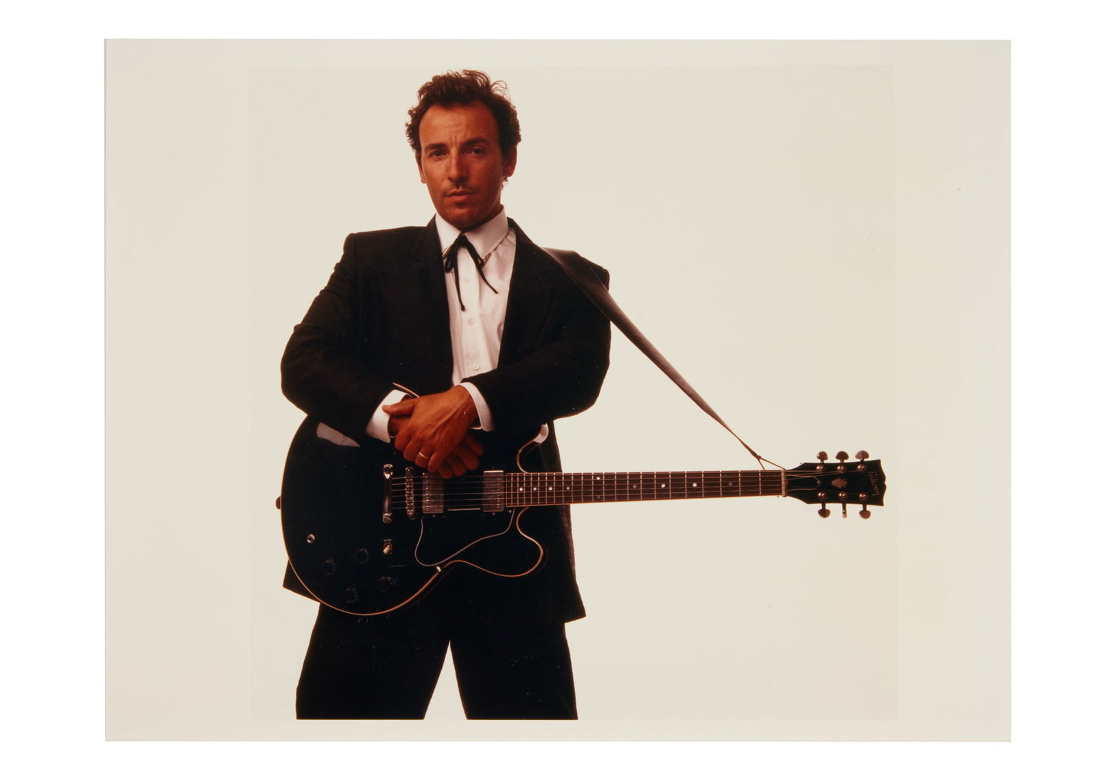 Bruce Springsteen | 1987 Stamped Annie Leibovitz "Tunnel of Love" Outtake Color Photo: A 1987 Annie Leibovitz color photograph of Bruce Springsteen, stamped on the verso. The image is an outtake from the photo shoot for Springsteen's studio album, Tunnel of Love.