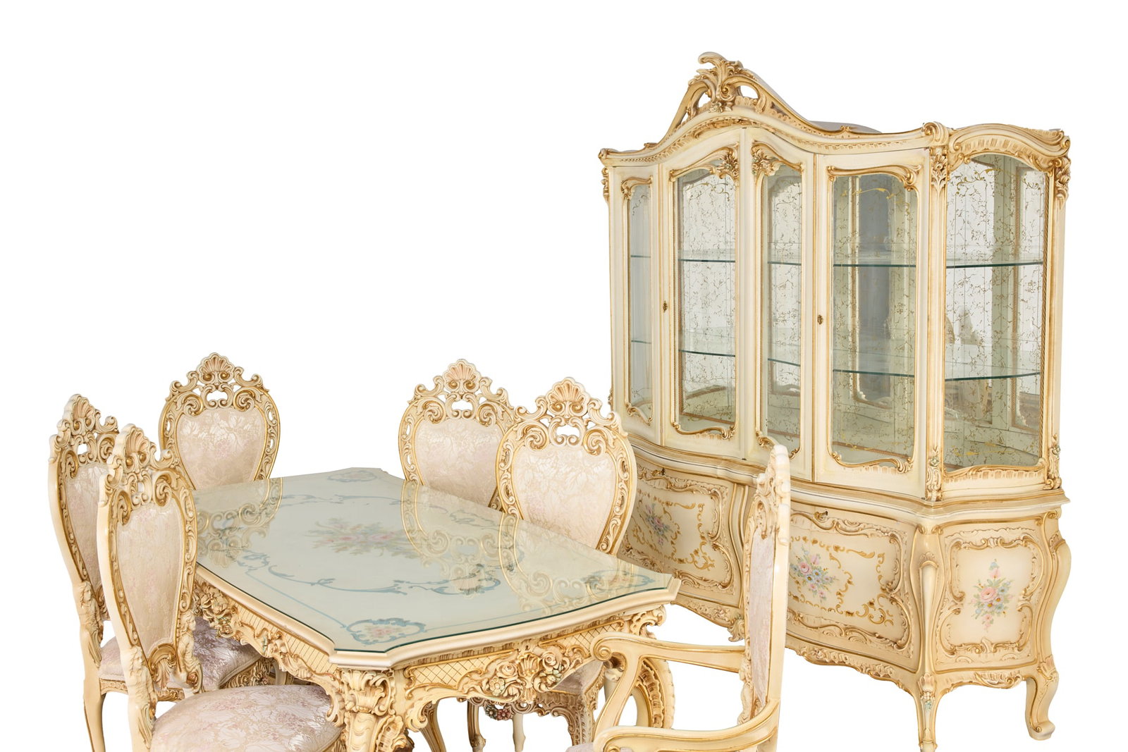 Liberace | Venetian Rococo Style Painted Dining Suite and Documents: A vintage eight-piece dining room set, the elaborately carved glass-topped table marked "Liberace," having floral and shell-form aprons and cabriole legs joined by a stretcher; the four side and two a
