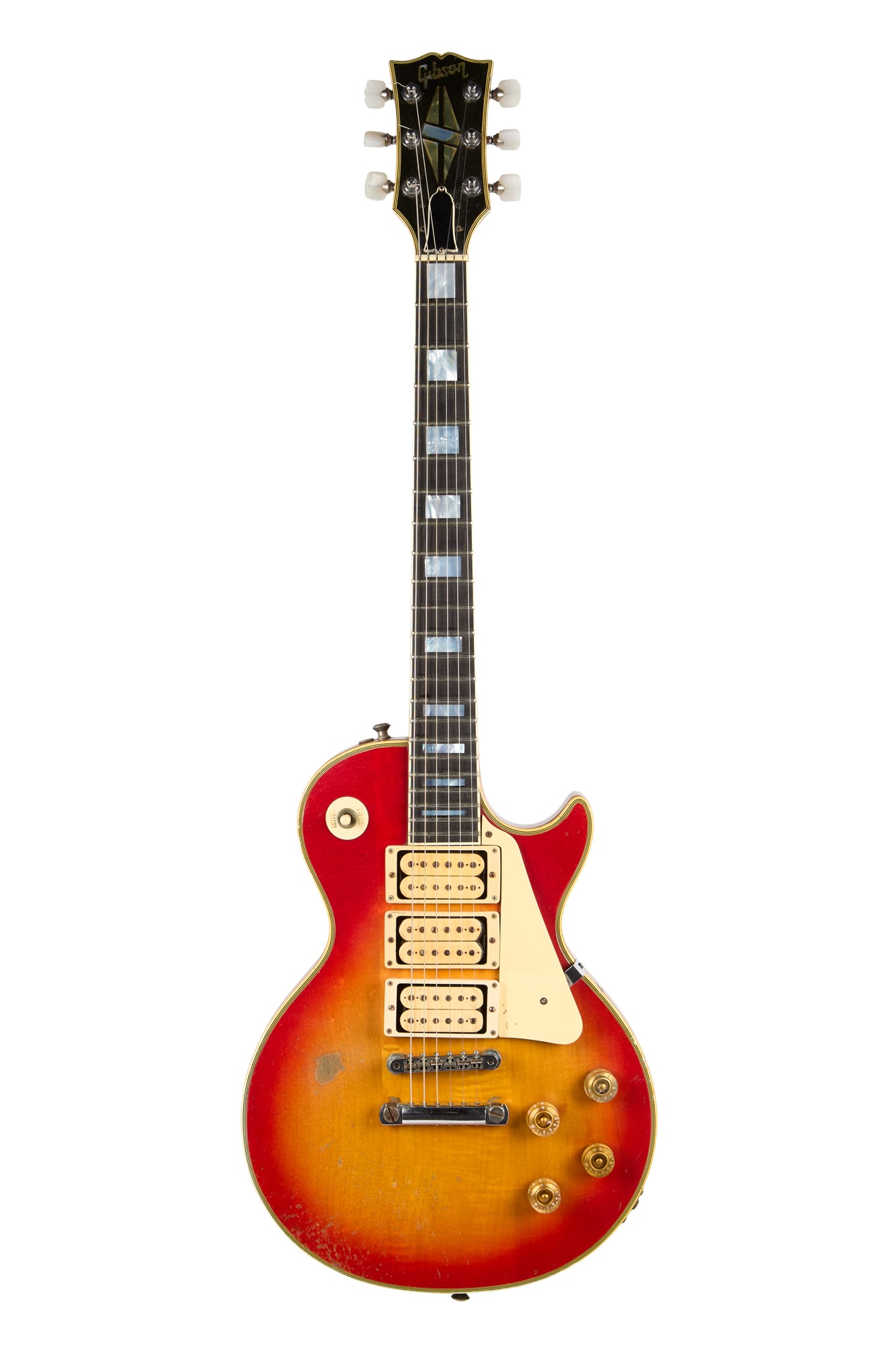 KISS | Ace Frehley's #1 "Budokan" 1975 Triple Pickup Gibson Les Paul Custom, Cherry Sunburst: Ace Frehley's stage played #1 "Budokan" 1975 Gibson Les Paul Custom with three cream pickups and cherry sunburst finish, serial #657947 with what appears to be an A prefix. Instantly recognizable as A