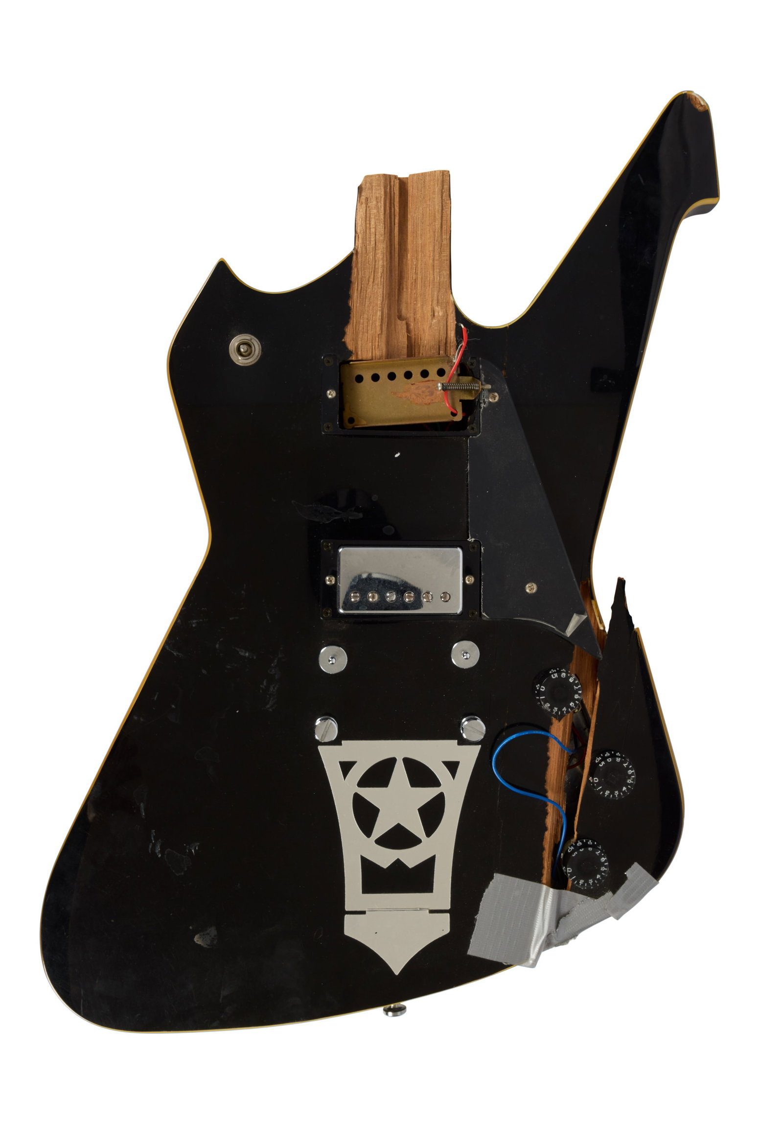 KISS | Paul Stanley Smashed Washburn PS Guitar Lane Bryant at Roseland Ballroom NYC, 2002: The body of a Washburn Paul Stanley electric guitar which is said to have been smashed by Paul Stanley of KISS himself at the Roseland Ballroom in NYC during the Lane Bryant Fashion Show on February 5