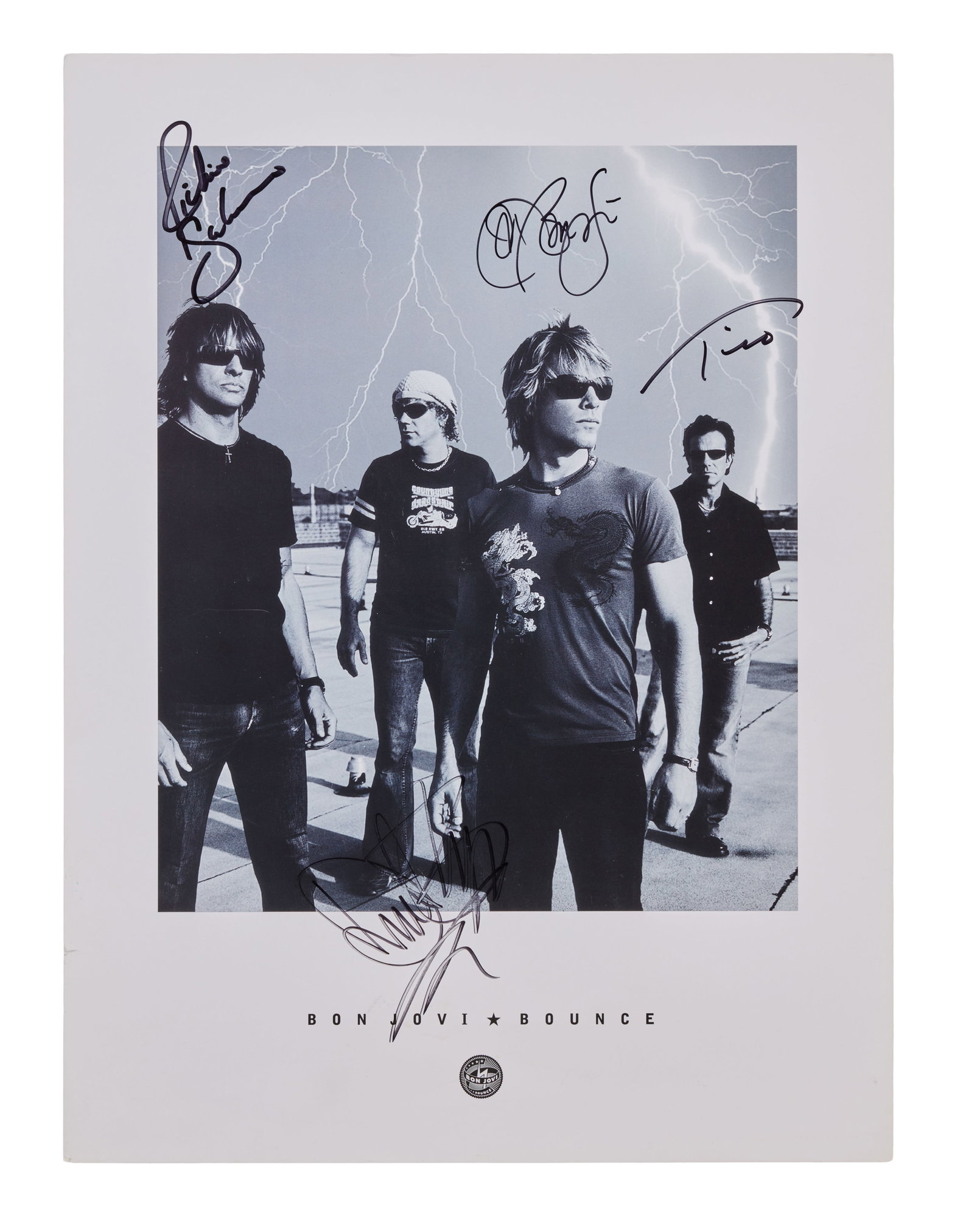 Bon Jovi | 2002 Band Signed "Bounce" Photograph: A large format 2002 Bon Jovi "Bounce" photograph signed on the front by the group. 
