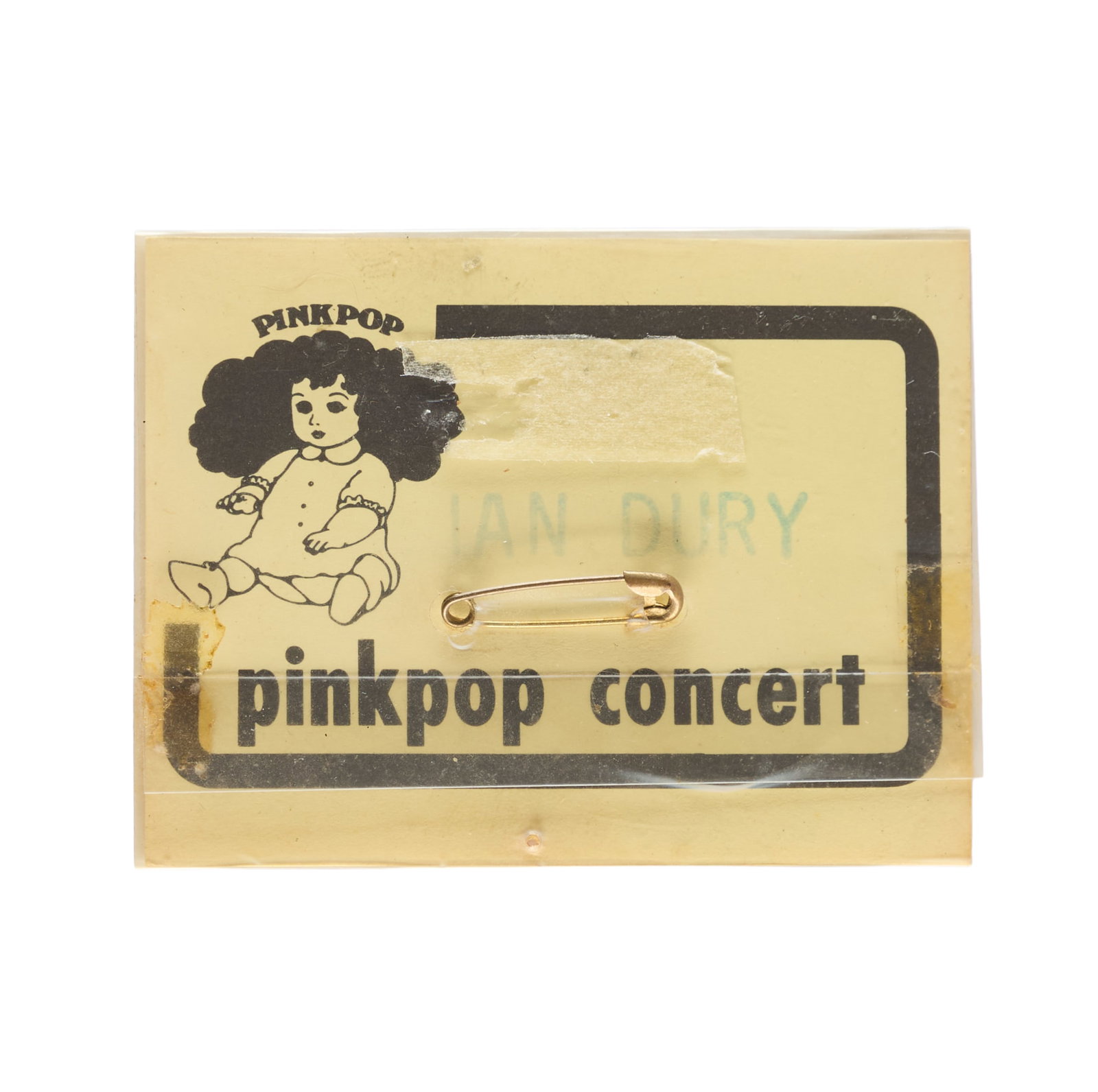 Ian Dury and the Blockheads | 1978 Signed Roadie Badge: A roadie badge from the Ian Dury and the Blockheads concert at Paradiso, which took place in Amsterdam on March 3, 1978, signed to the back "Dury is Ian" in black ink by Ian. Accompanied by a ph